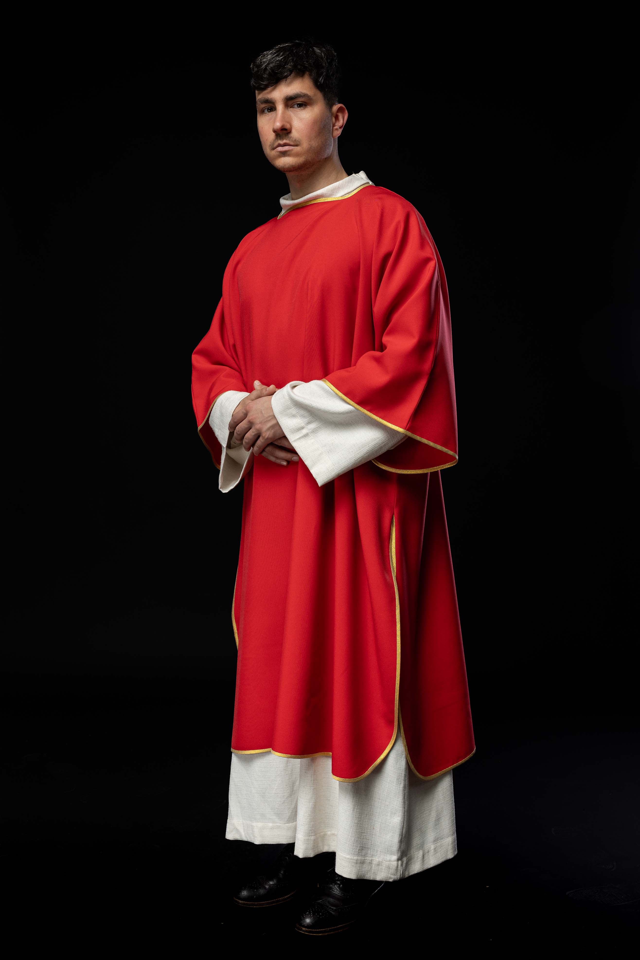 Plain dalmatic in red with gold trim