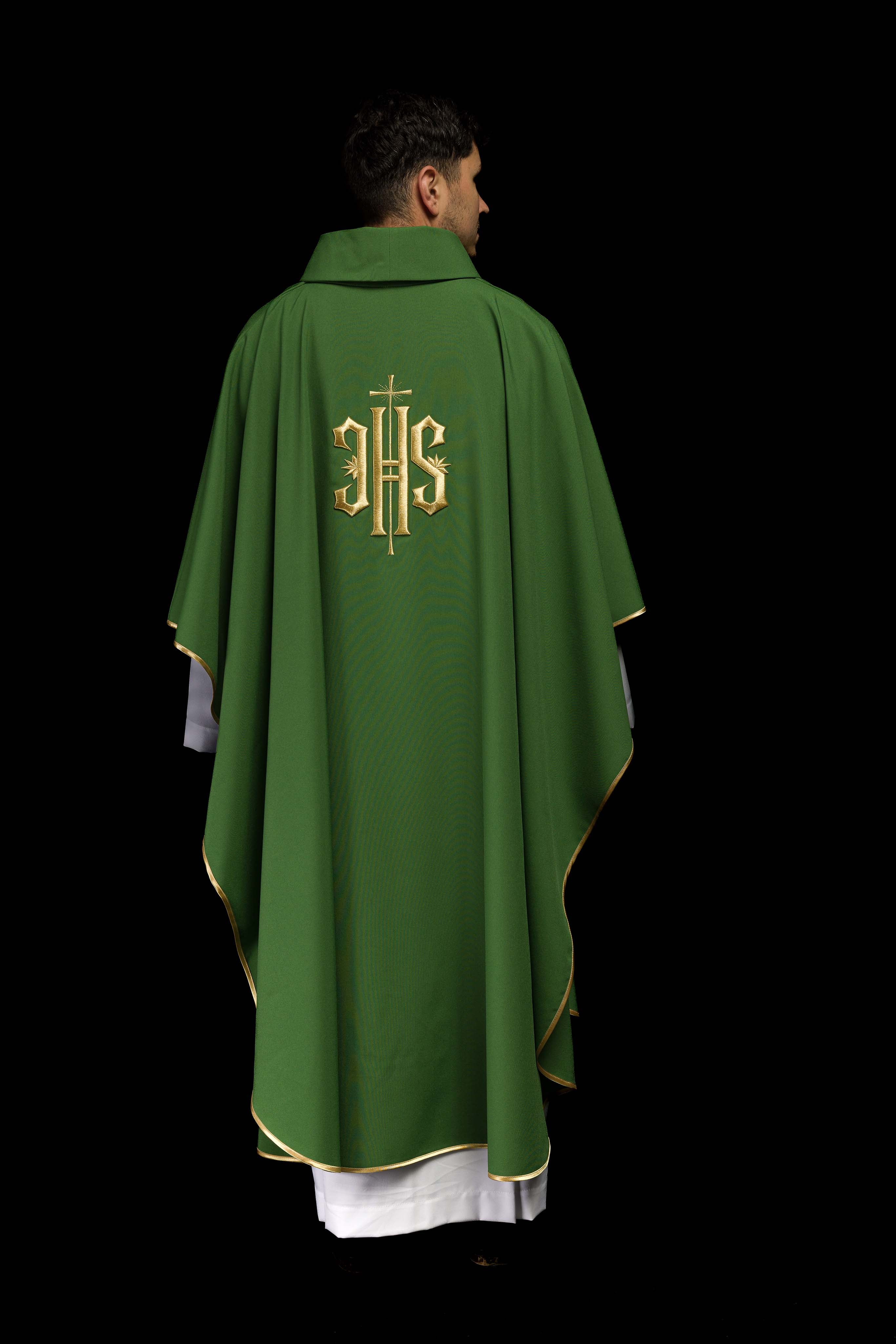 Green chasuble embroidered with IHS motif