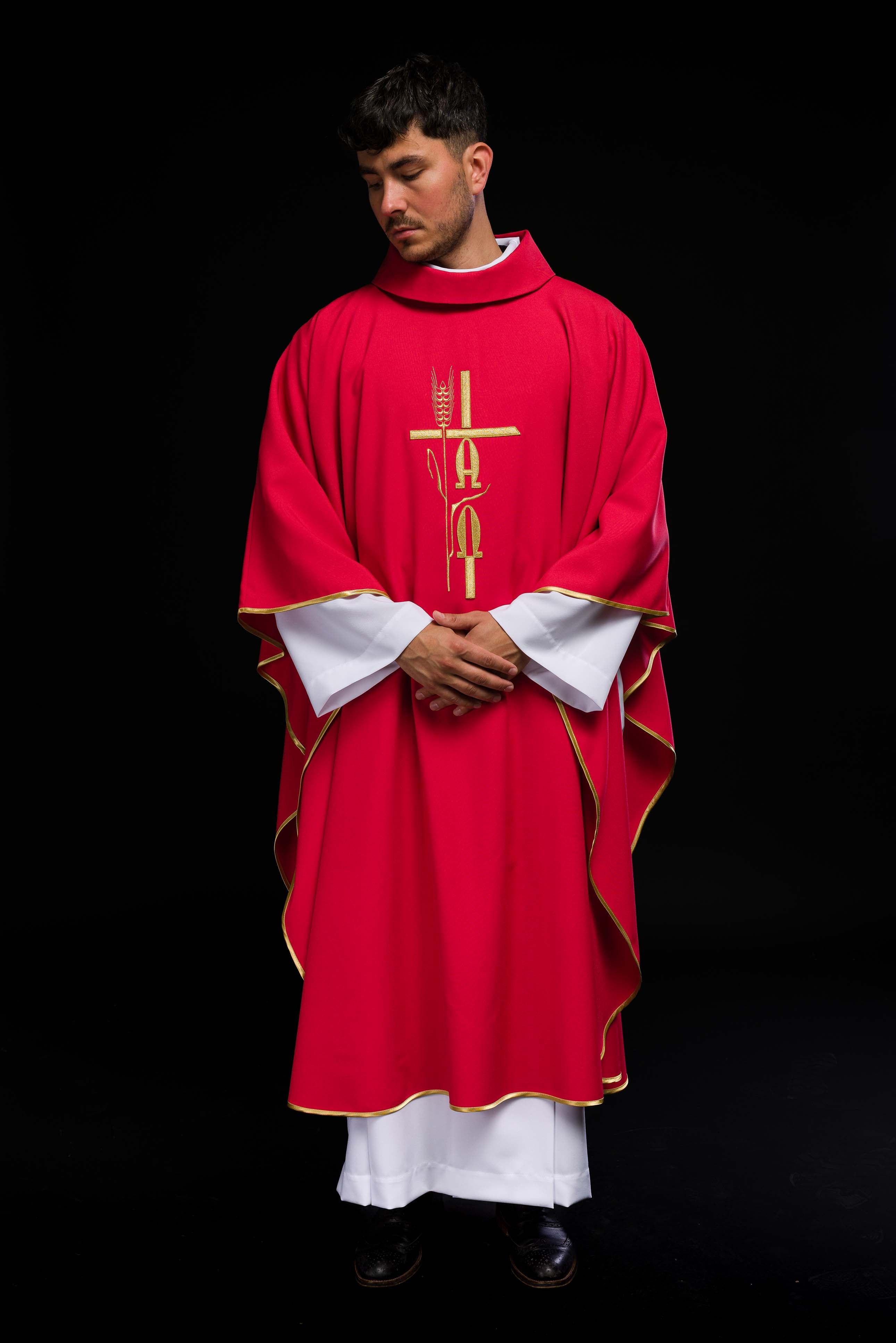 Red chasuble with cross and alfa omega symbols
