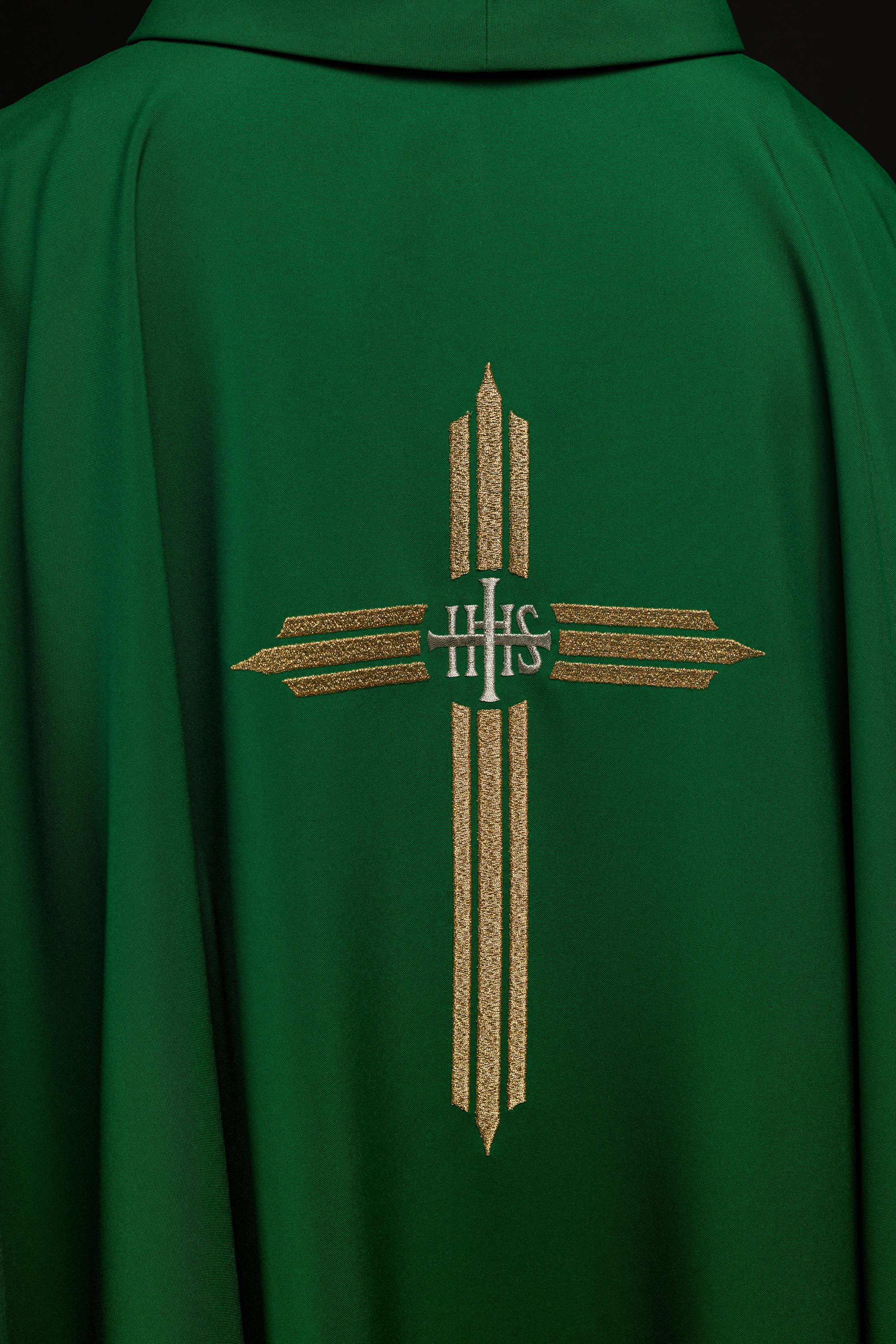 Green chasuble embroidered with the symbol of Cross IHS