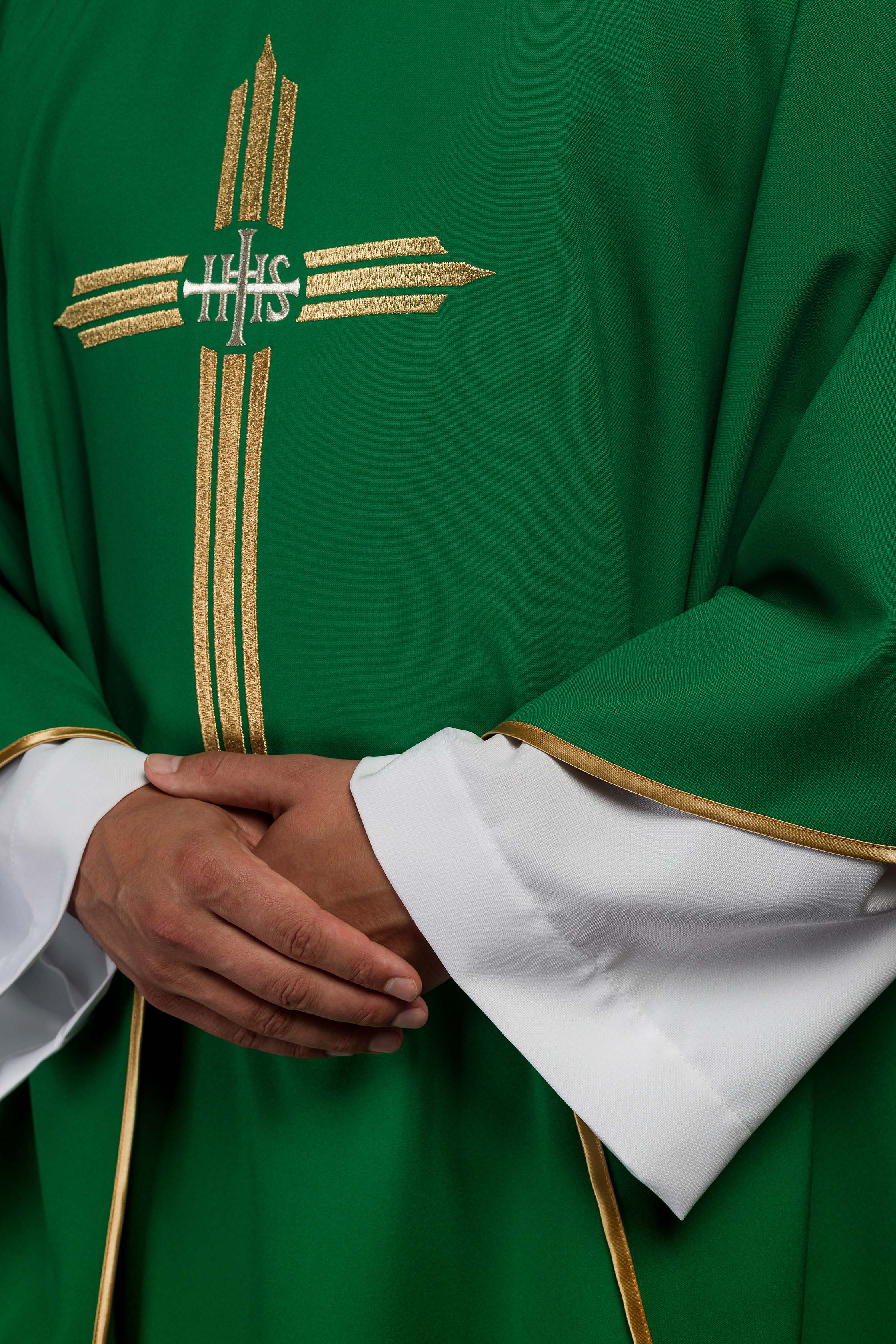 Green chasuble embroidered with the symbol of Cross IHS