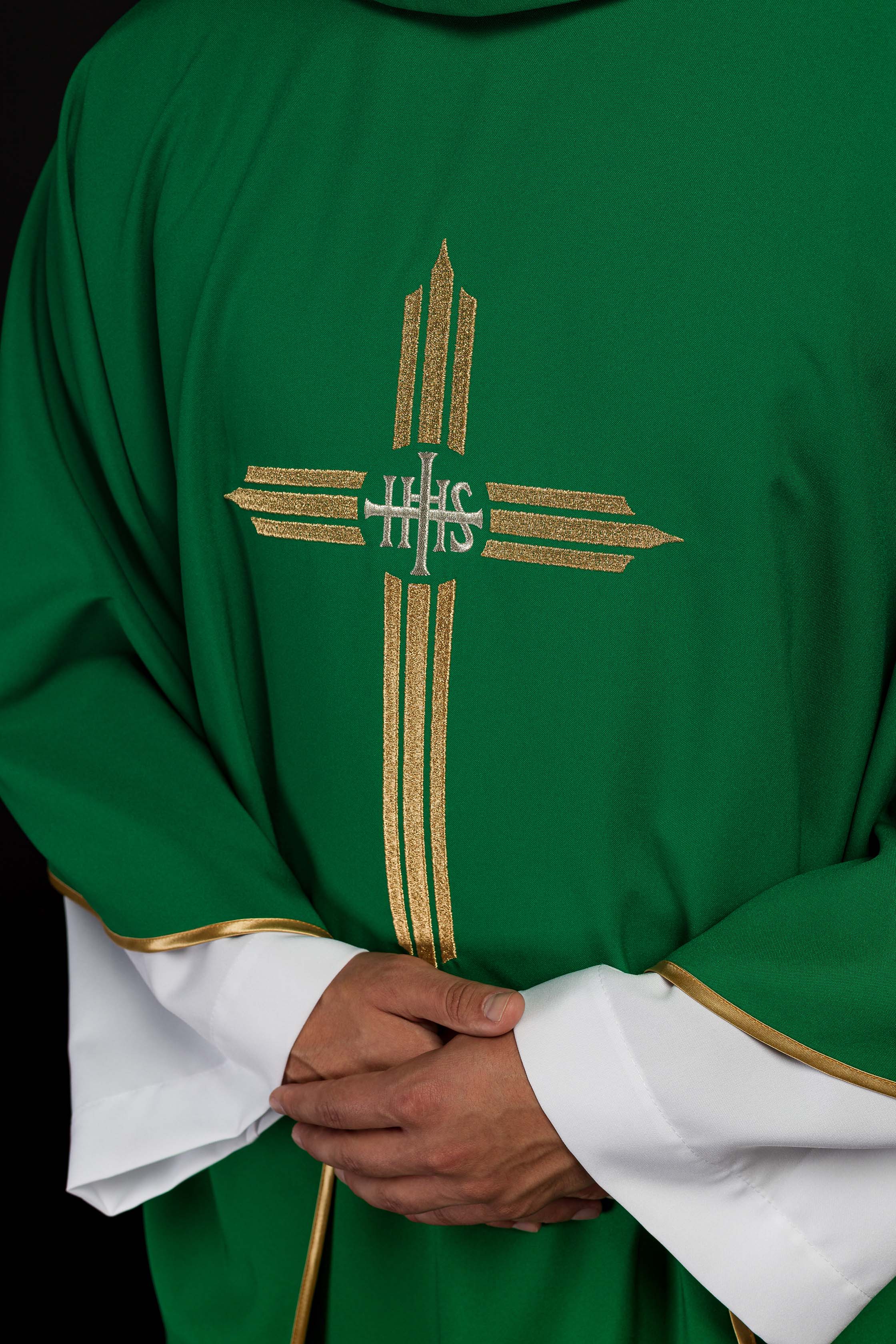 Green chasuble embroidered with the symbol of Cross IHS