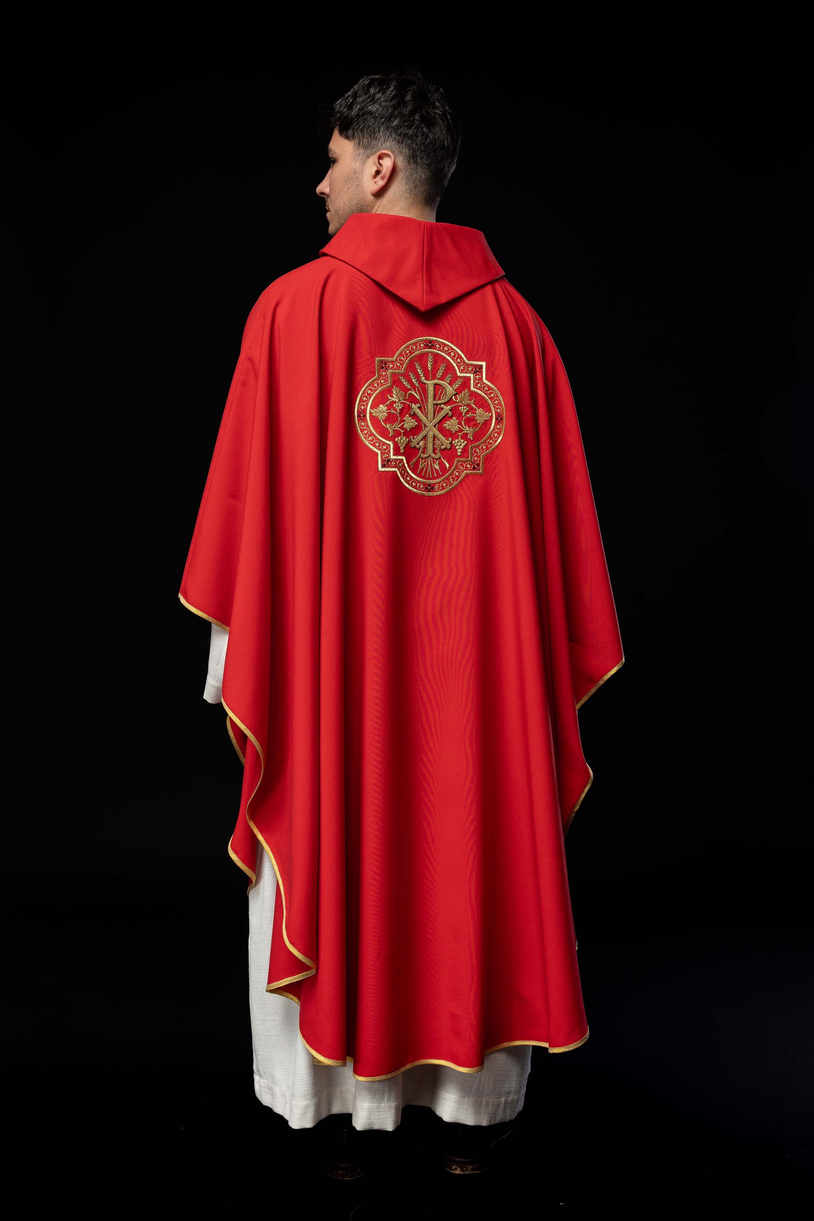 Red chasuble with IHS and PAX embroidery