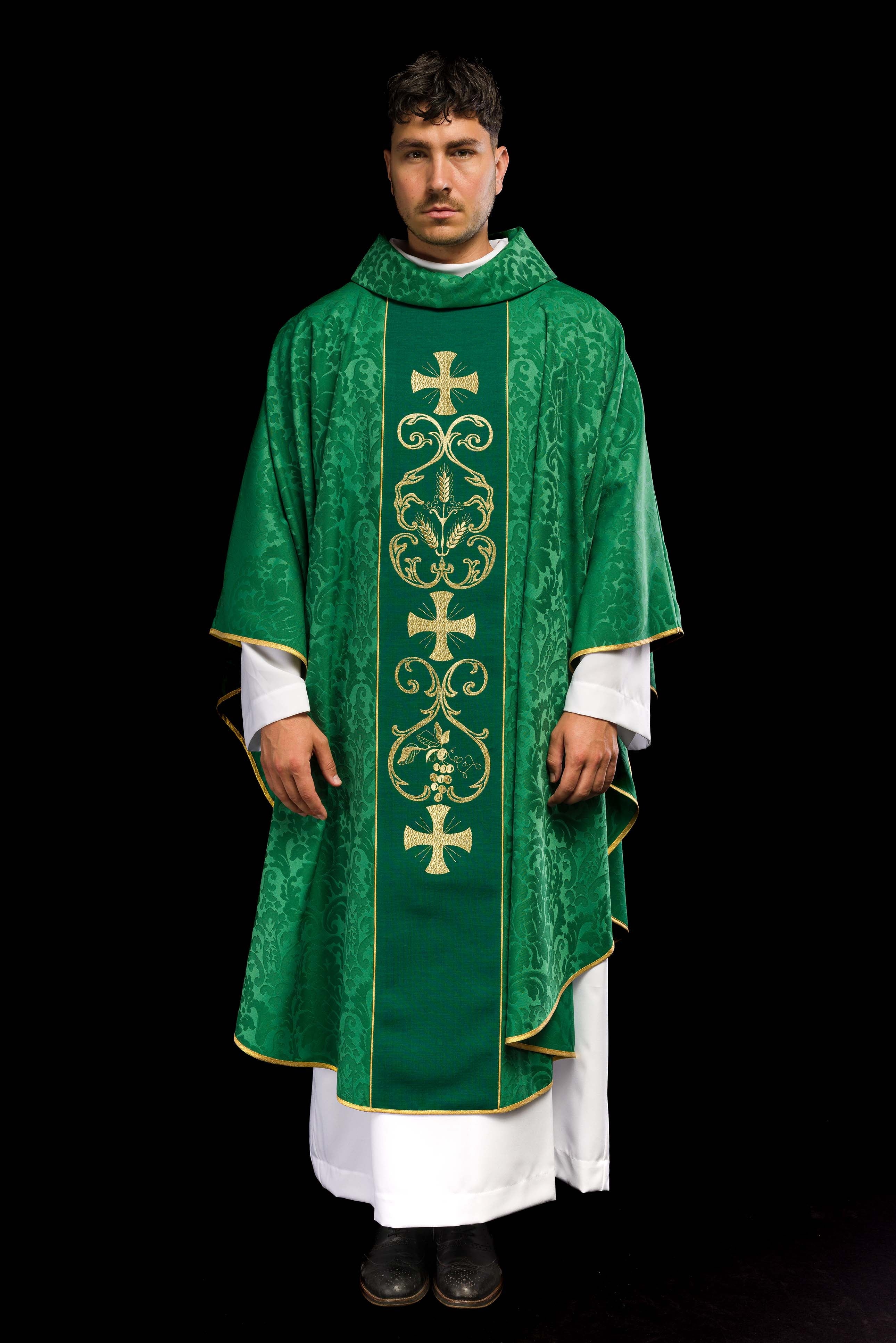 Green liturgical chasuble decorated with an embroidered belt