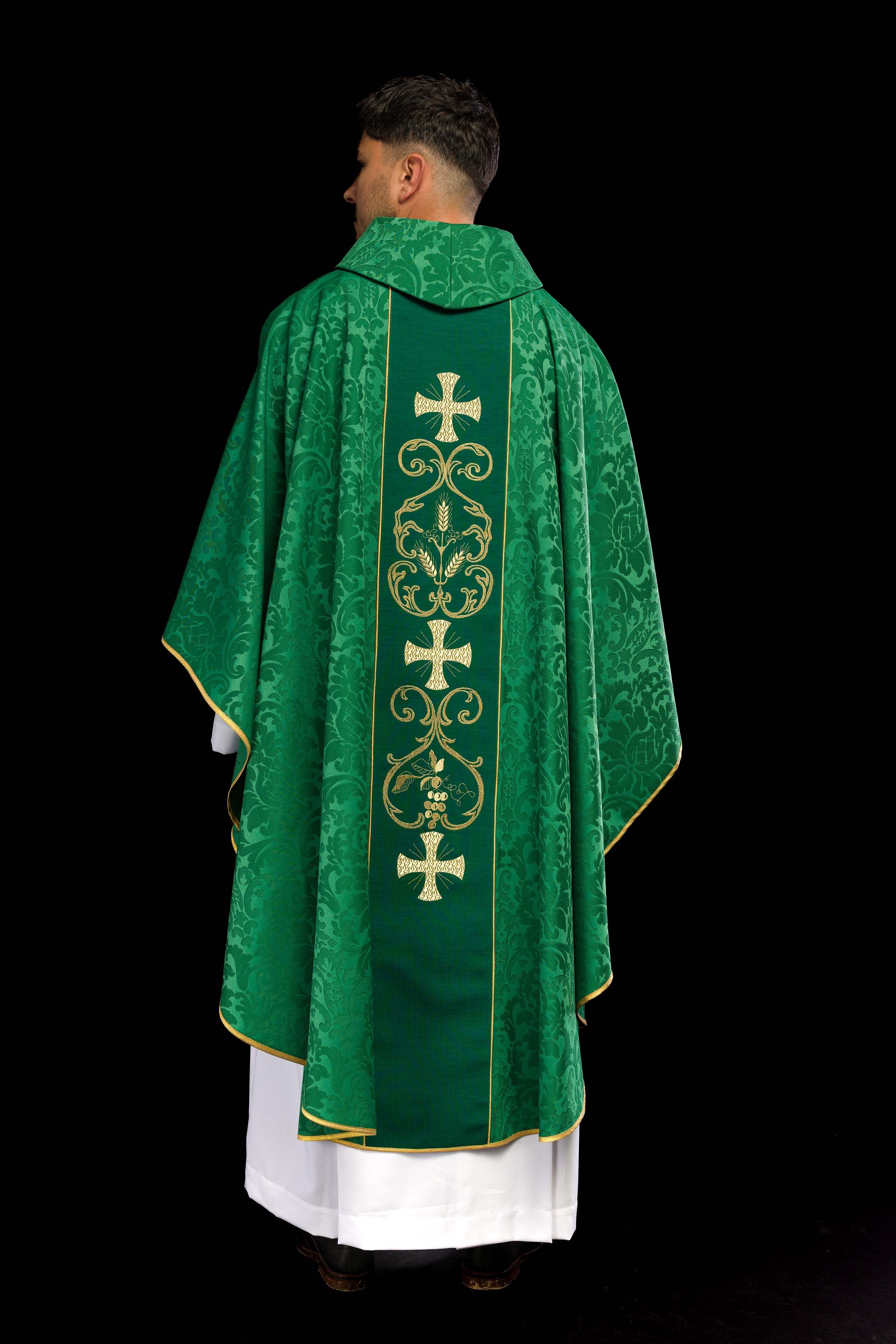 Green liturgical chasuble decorated with an embroidered belt