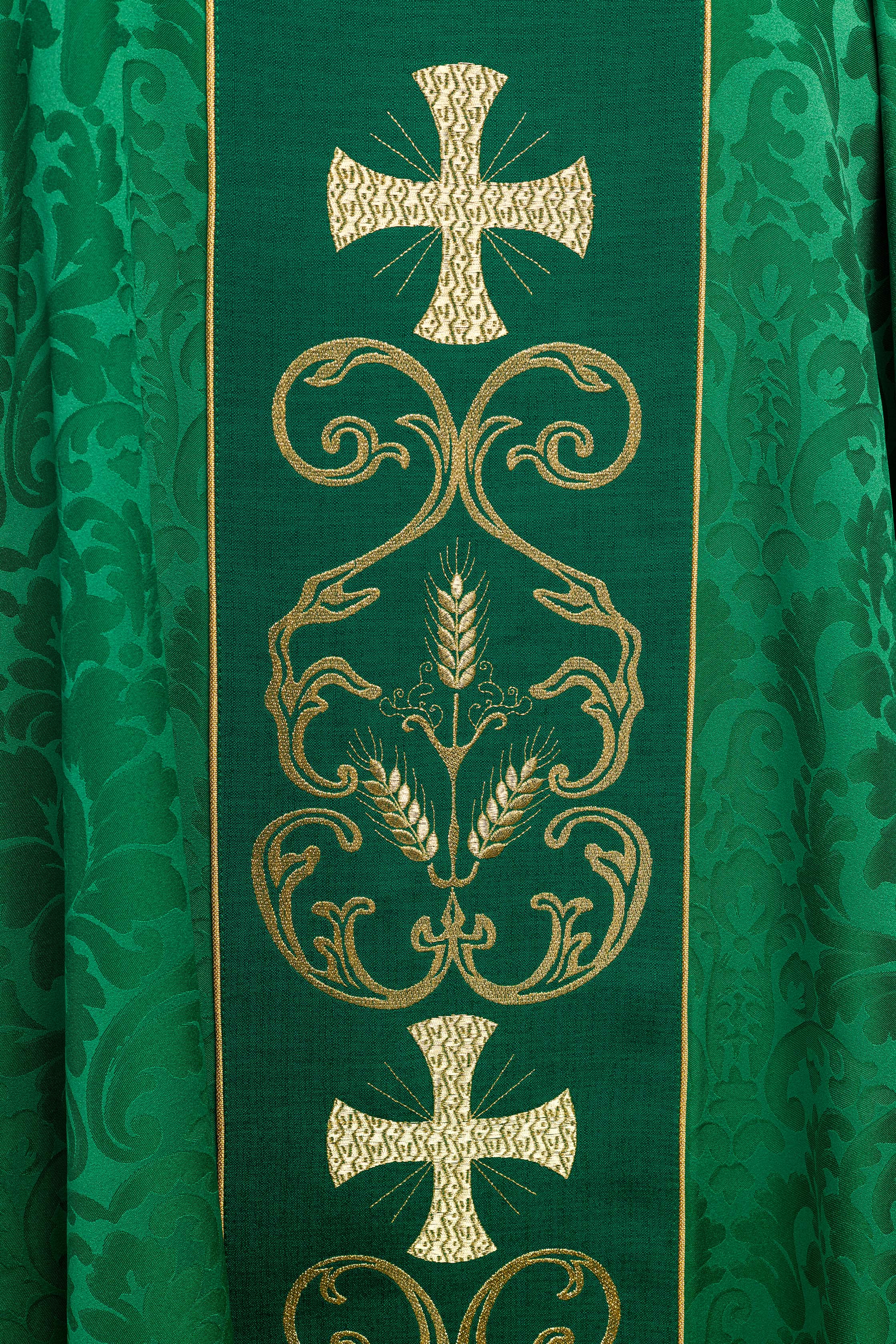 Green liturgical chasuble decorated with an embroidered belt