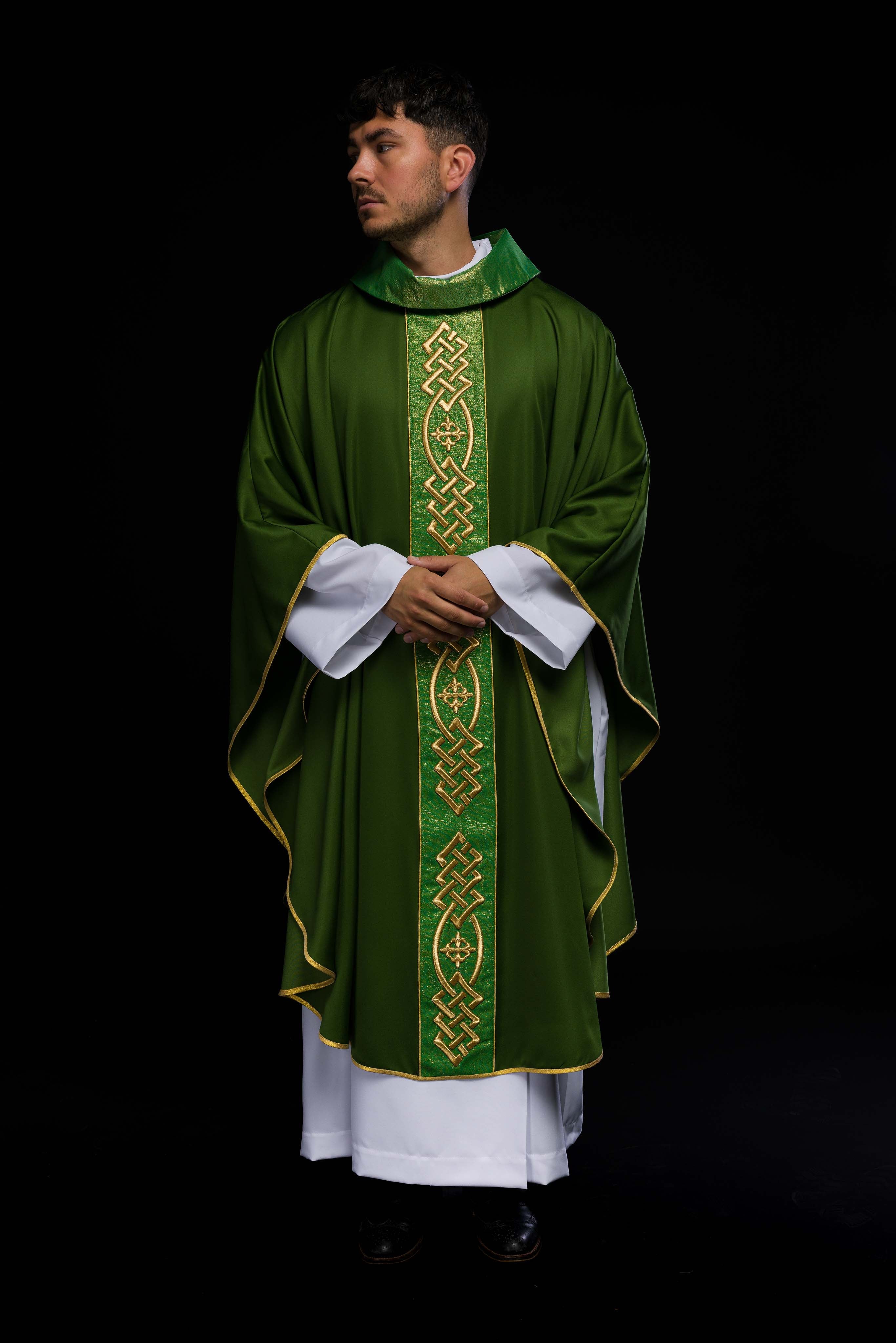 Richly embroidered green chasuble