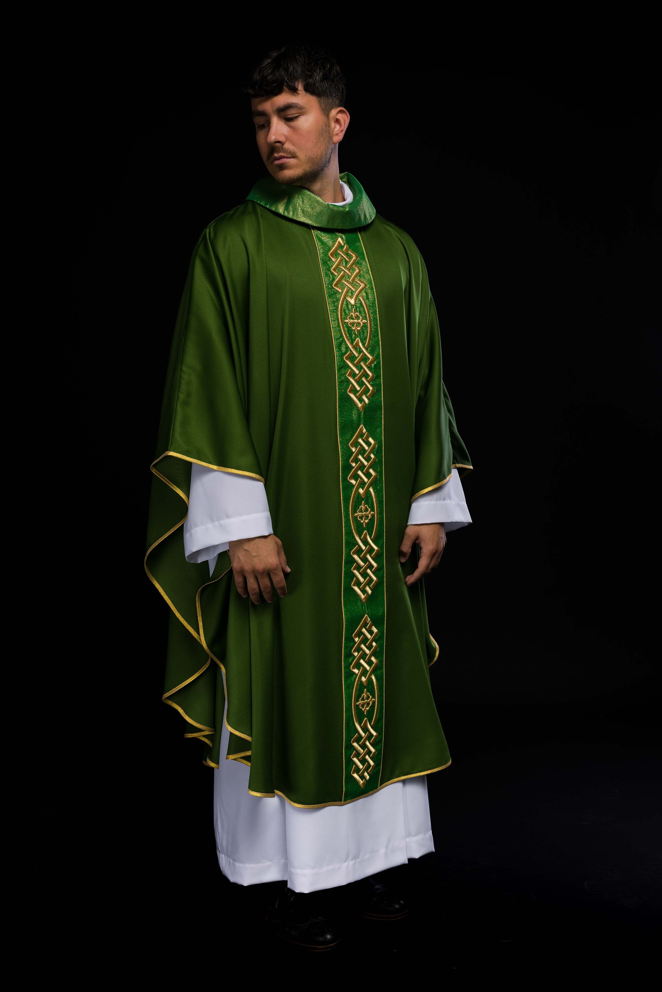 Richly embroidered green chasuble