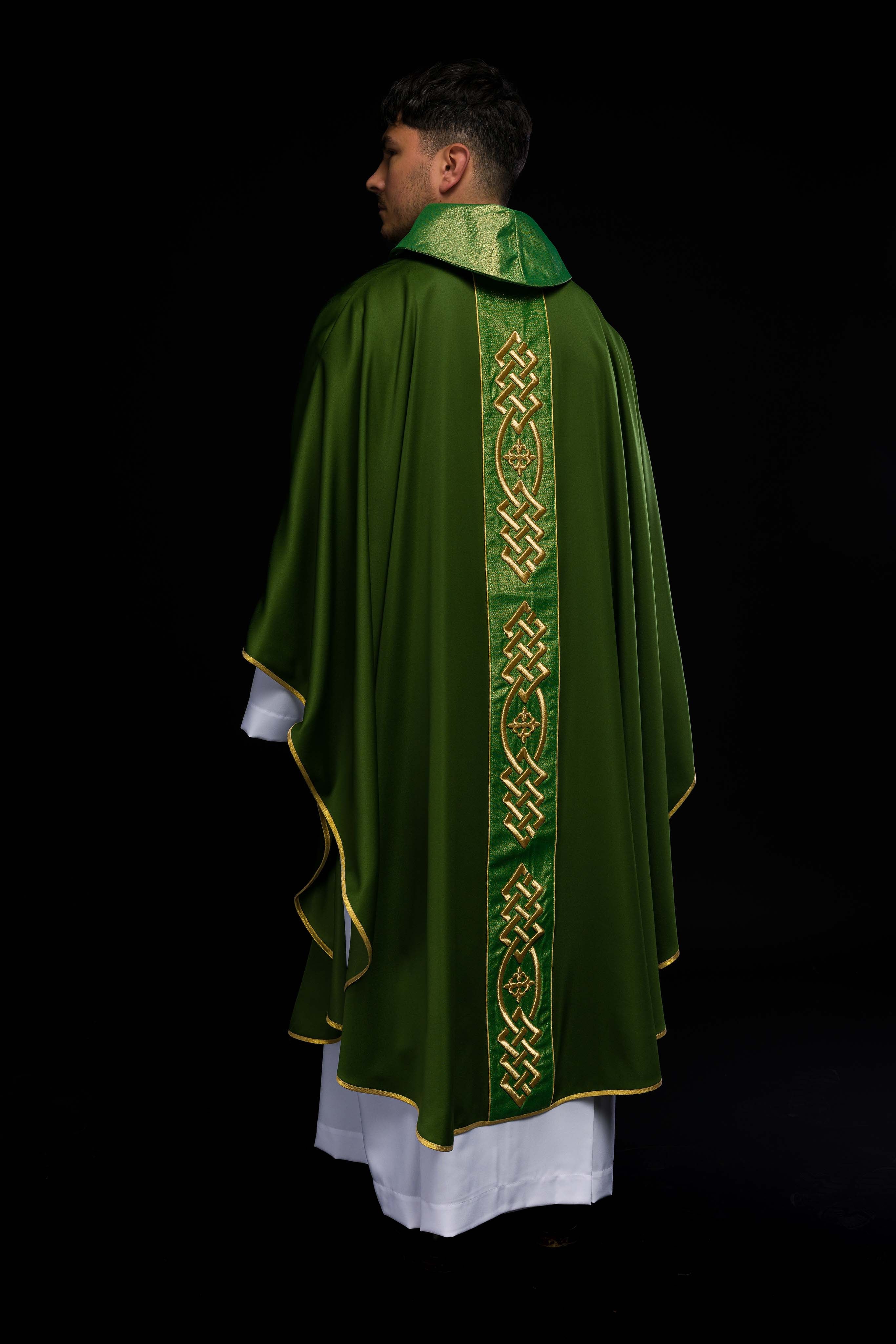 Richly embroidered green chasuble