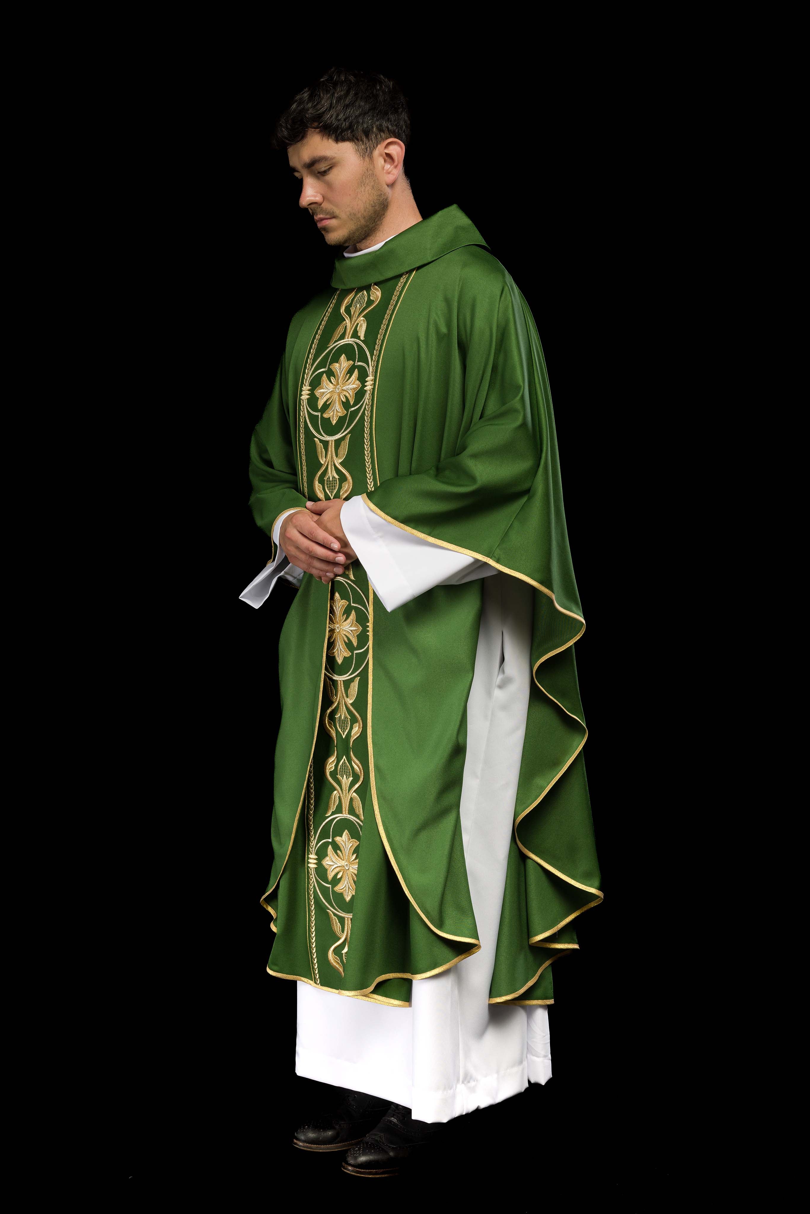 Richly embroidered green chasuble
