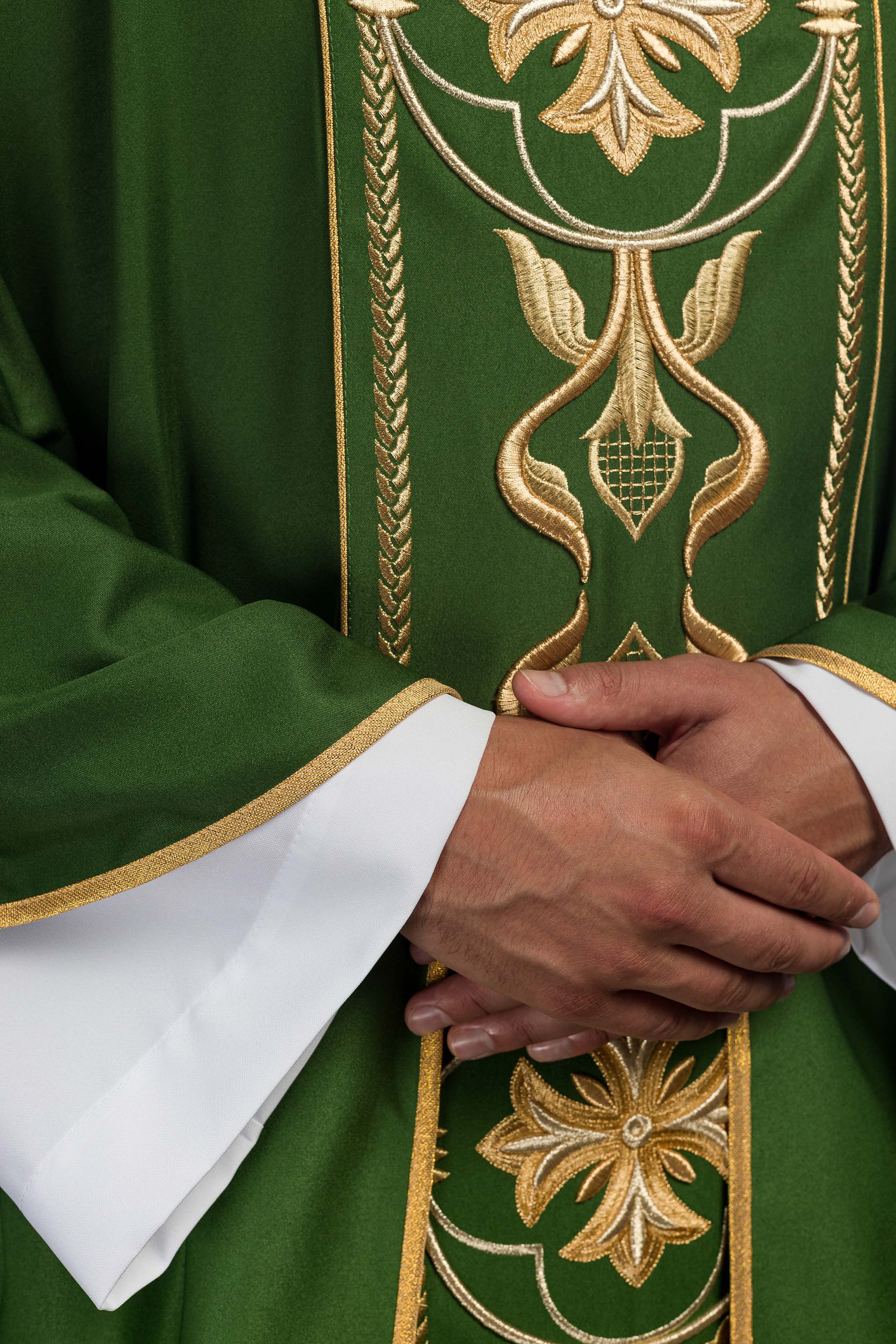 Richly embroidered green chasuble