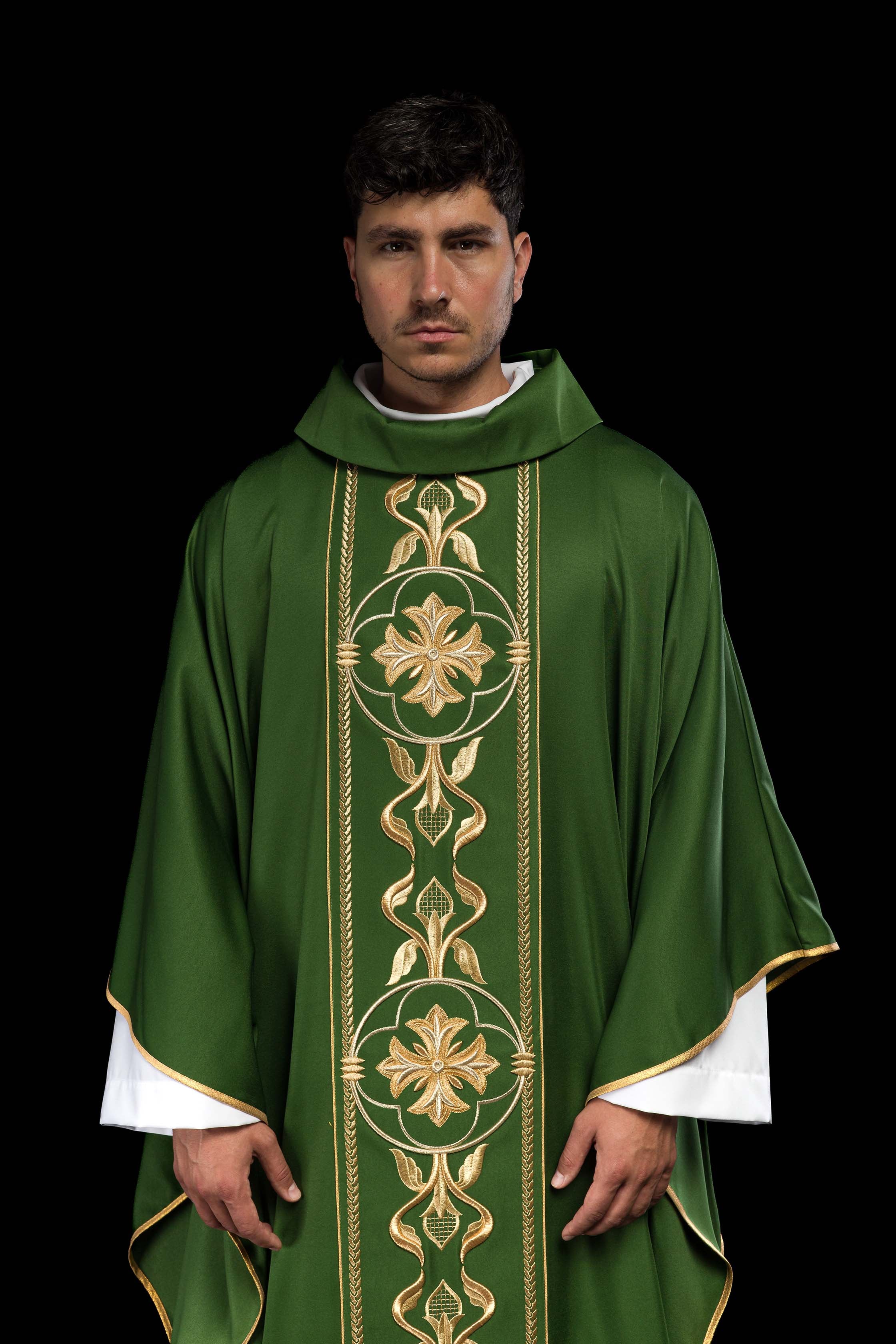 Richly embroidered green chasuble