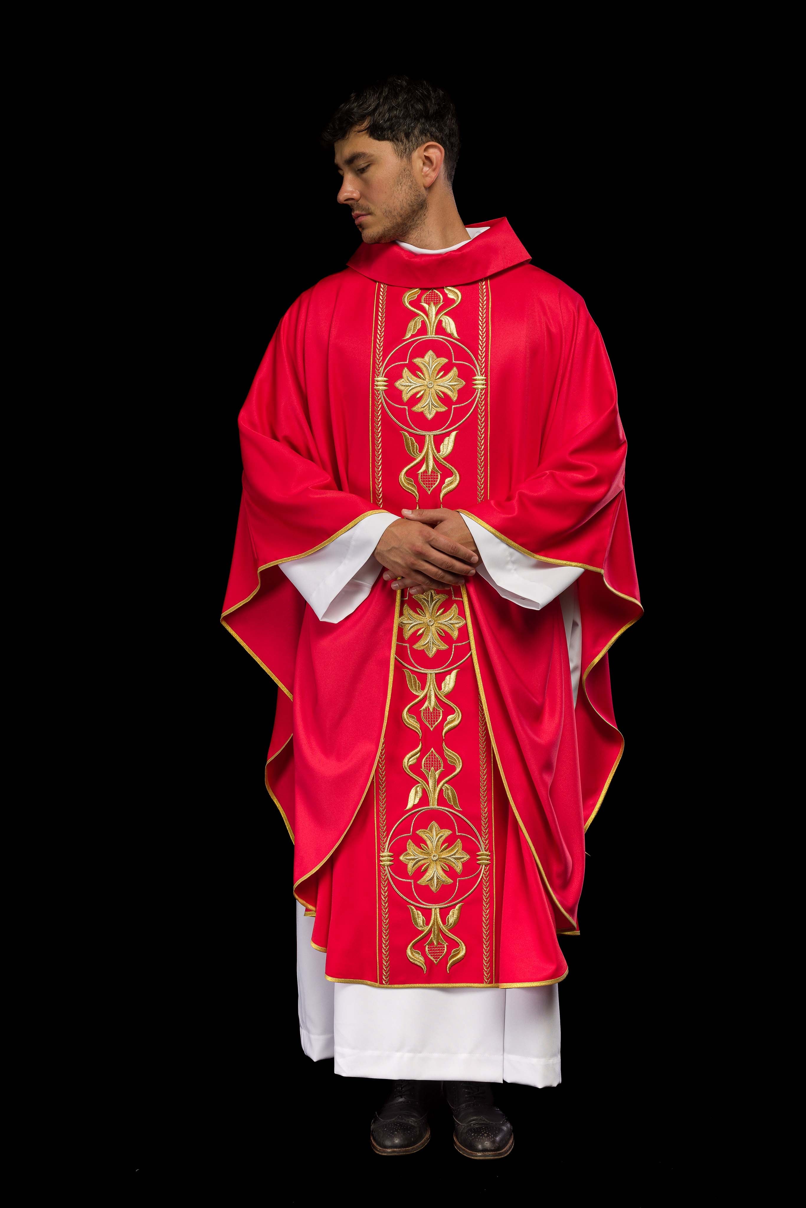 Embroidered red chasuble with decorative band