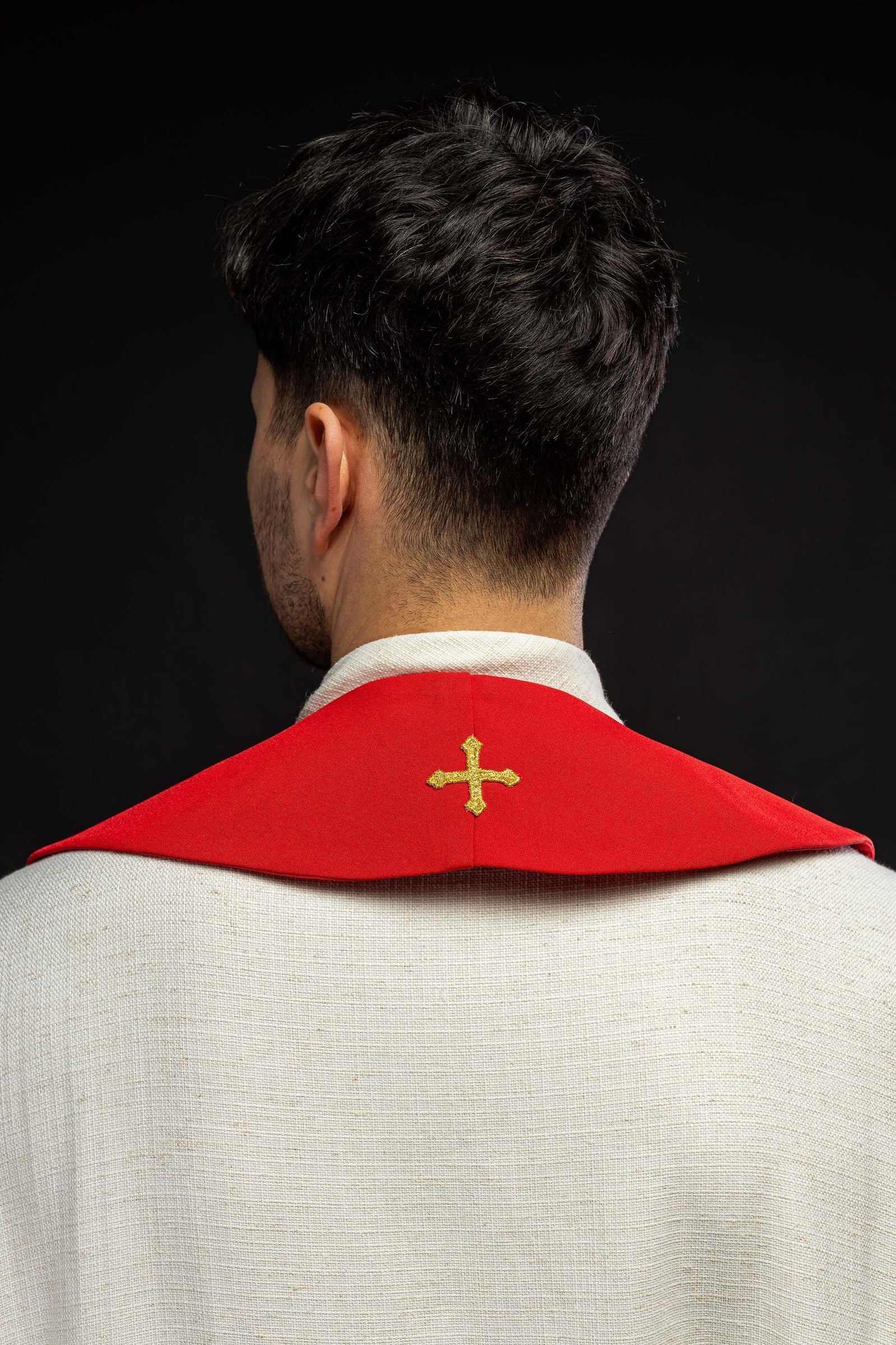 Red priestly stole embroidered with a Cross