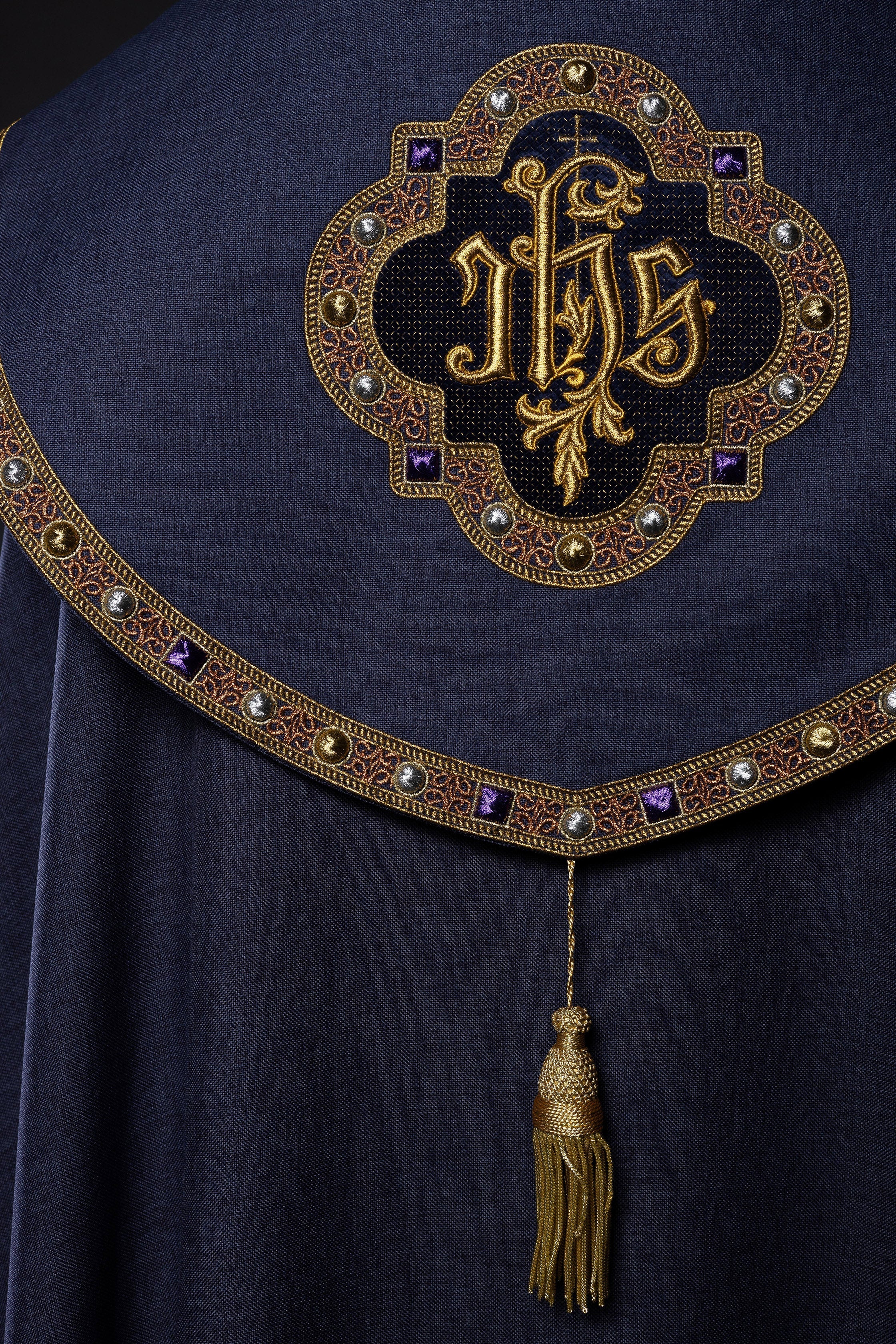 Purple liturgical cape with gold IHS