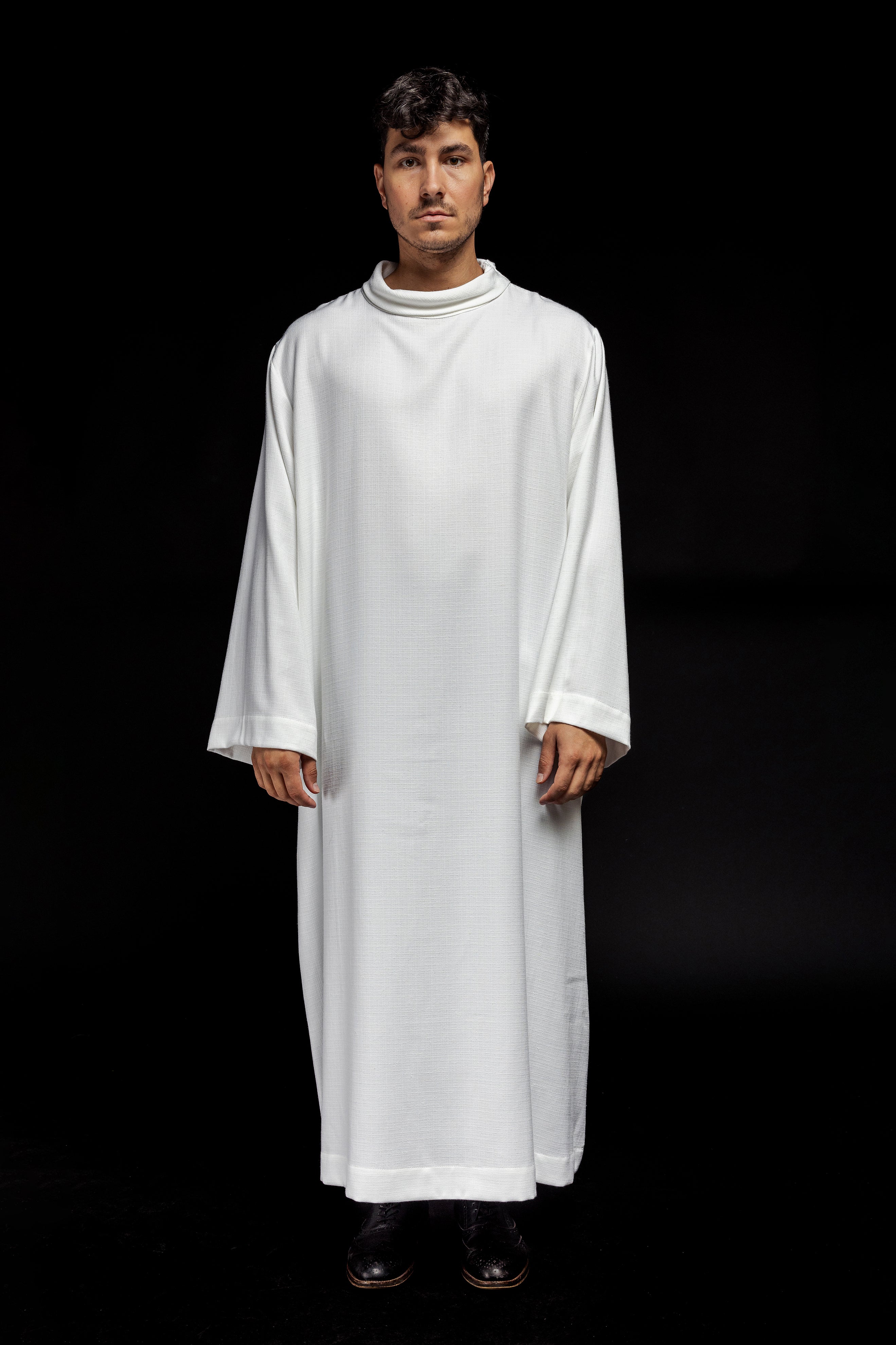 Clergy alb made of white linen fabric