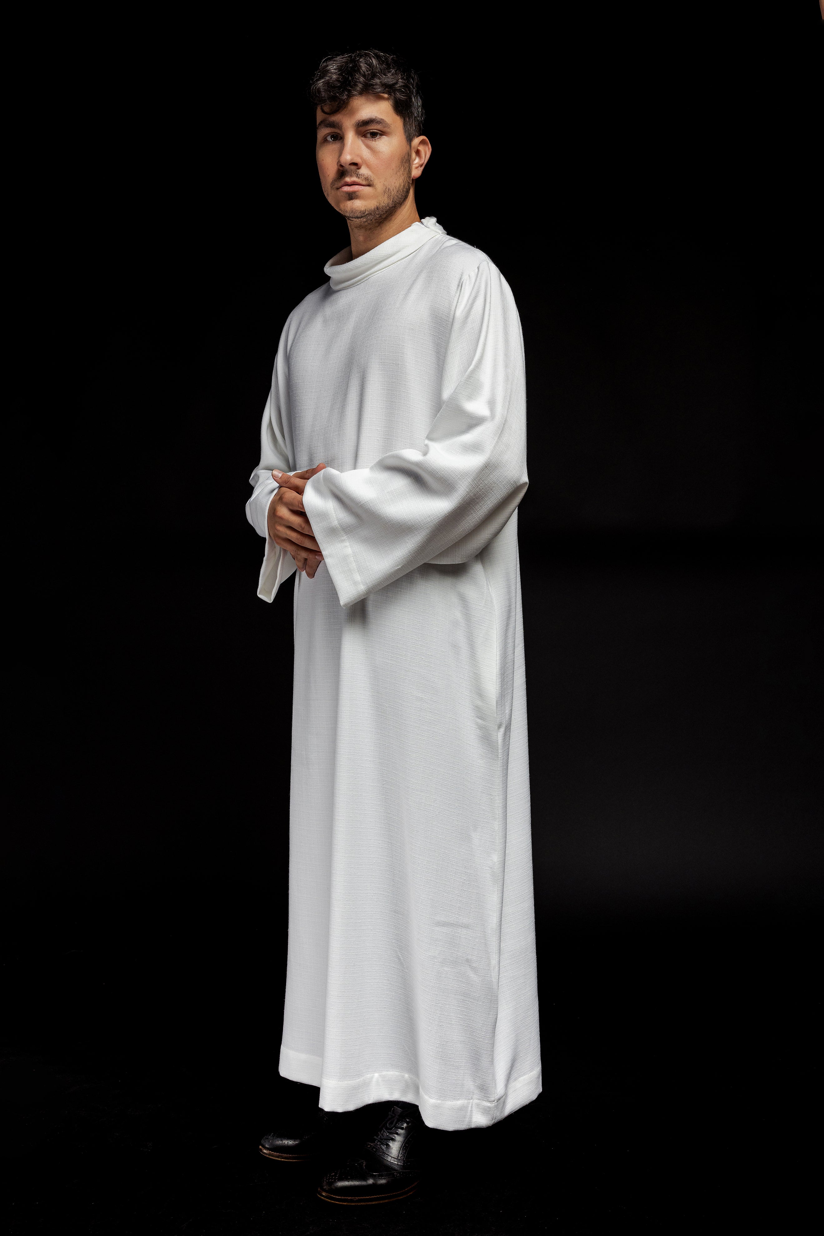 Clergy alb made of white linen fabric