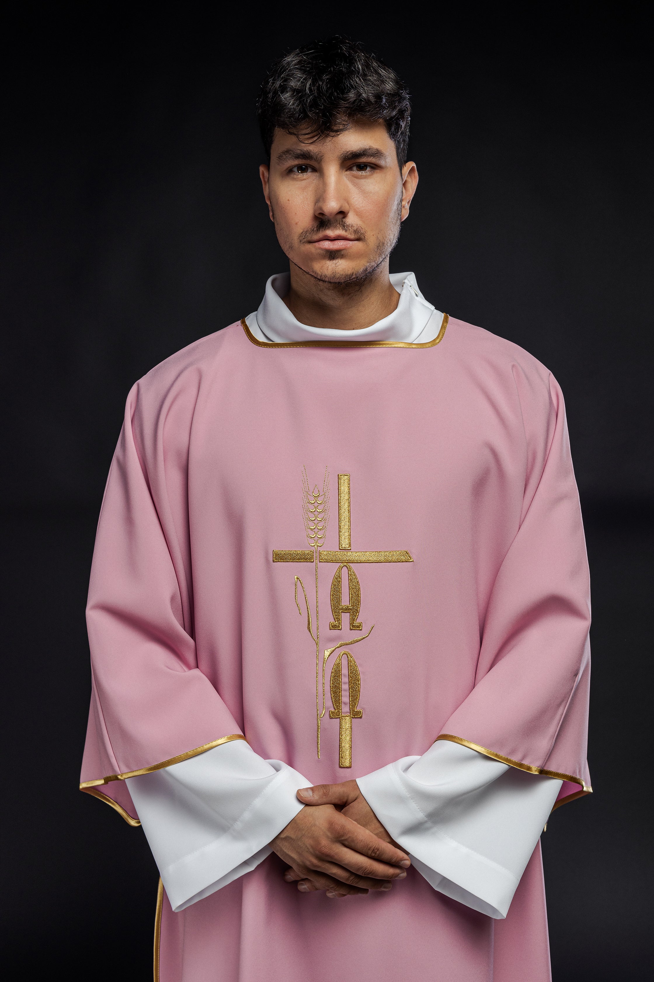 Pink deacon dalmatic with Alpha Omega embroidery