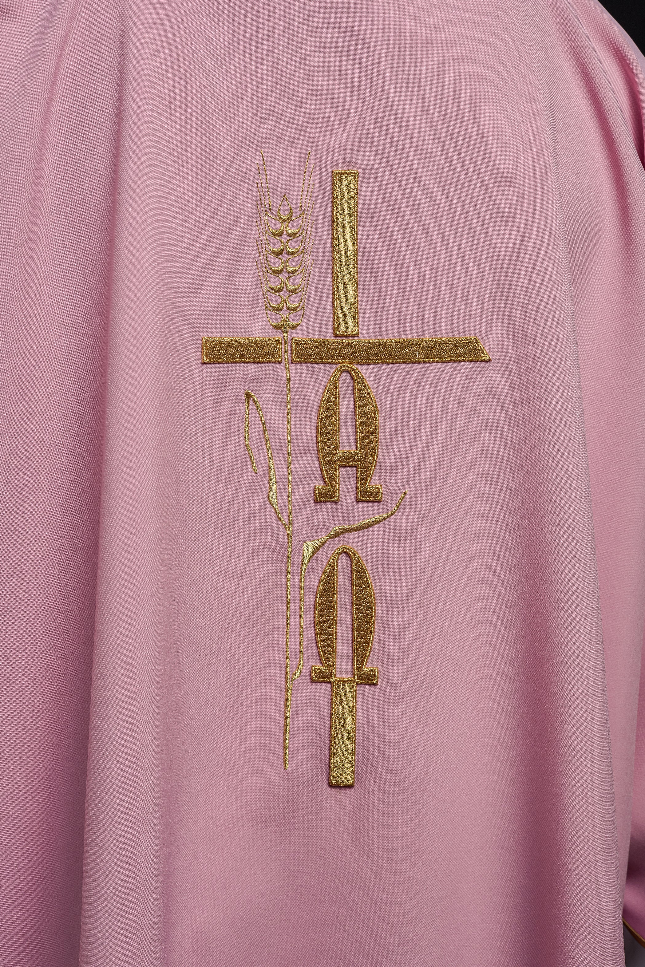 Pink deacon dalmatic with Alpha Omega embroidery