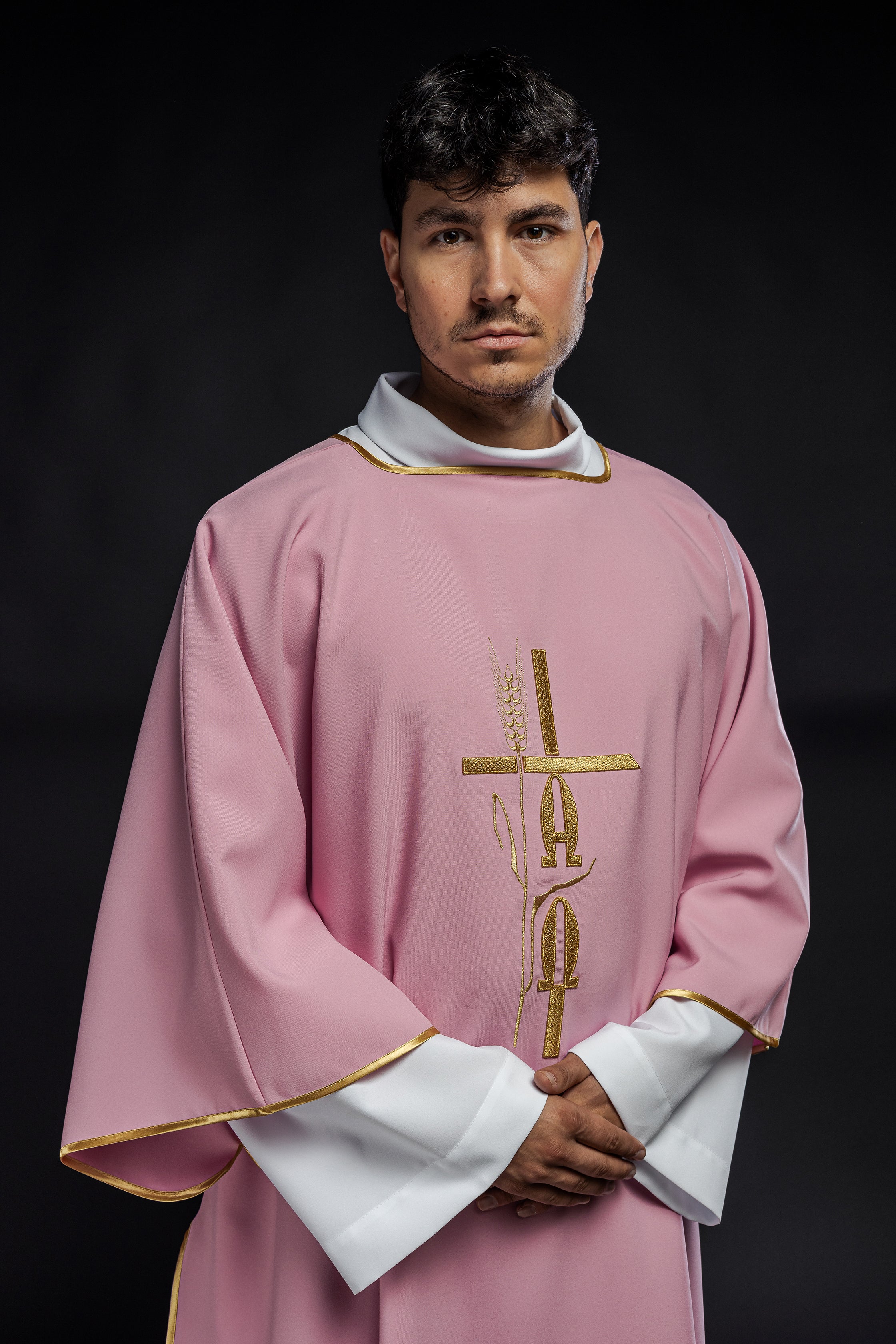 Pink deacon dalmatic with Alpha Omega embroidery