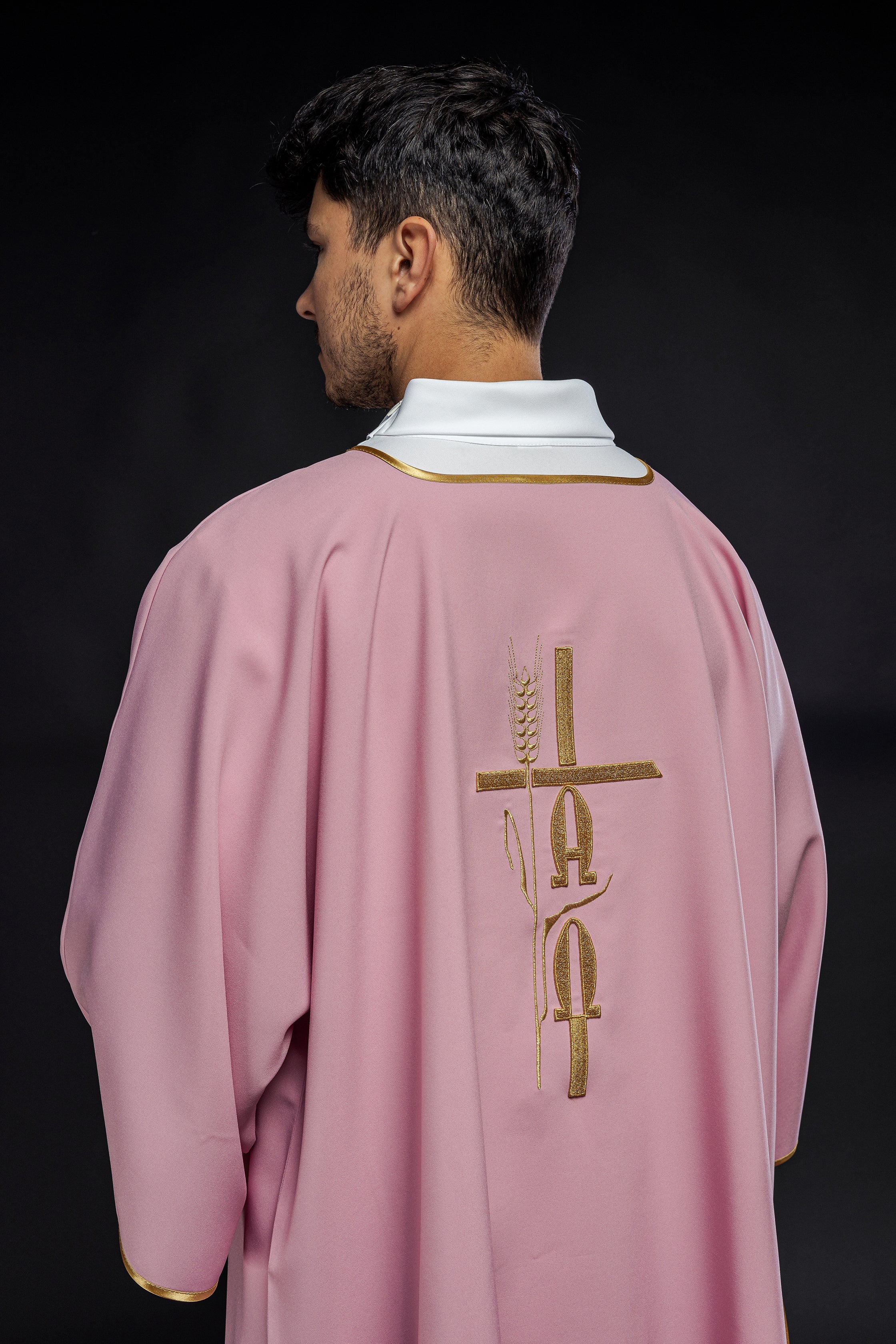 Pink deacon dalmatic with Alpha Omega embroidery