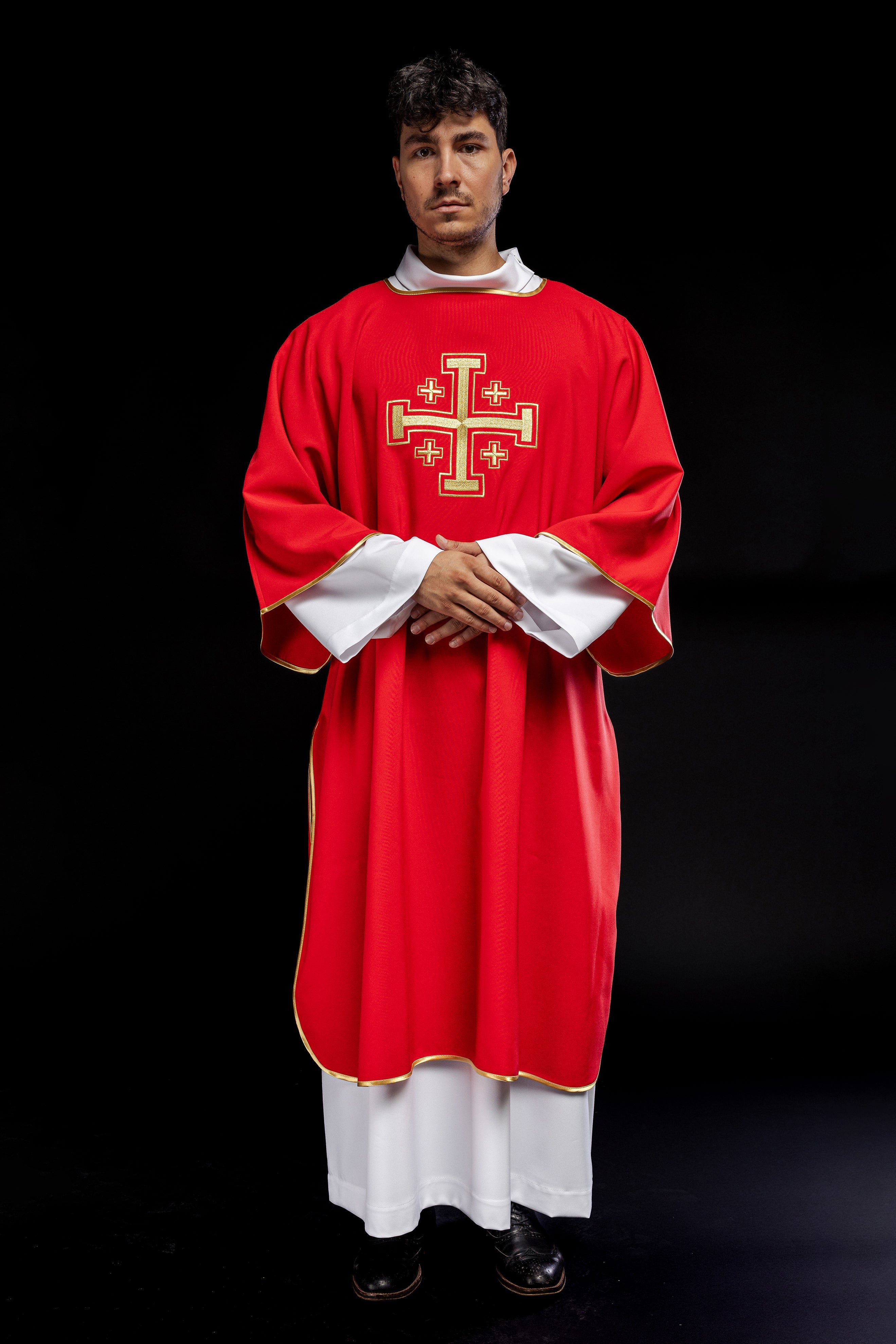 Red dalmatic priest with embroidered gold crosses