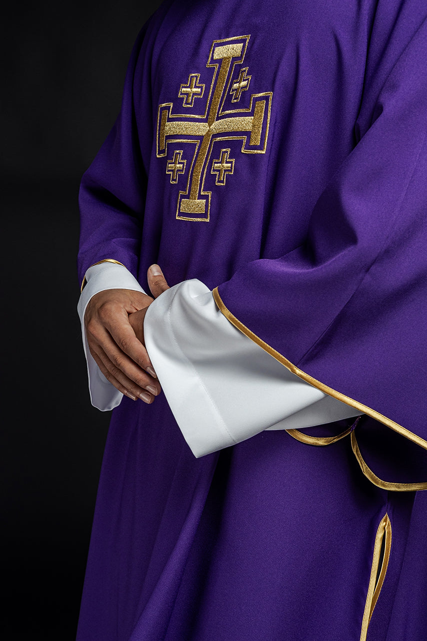 Purple dalmatic with embroidered gold crosses