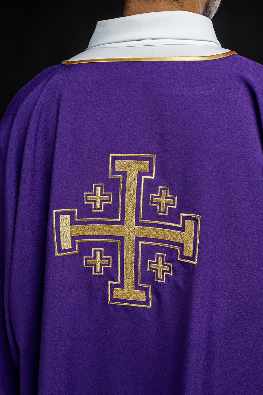 Purple dalmatic with embroidered gold crosses