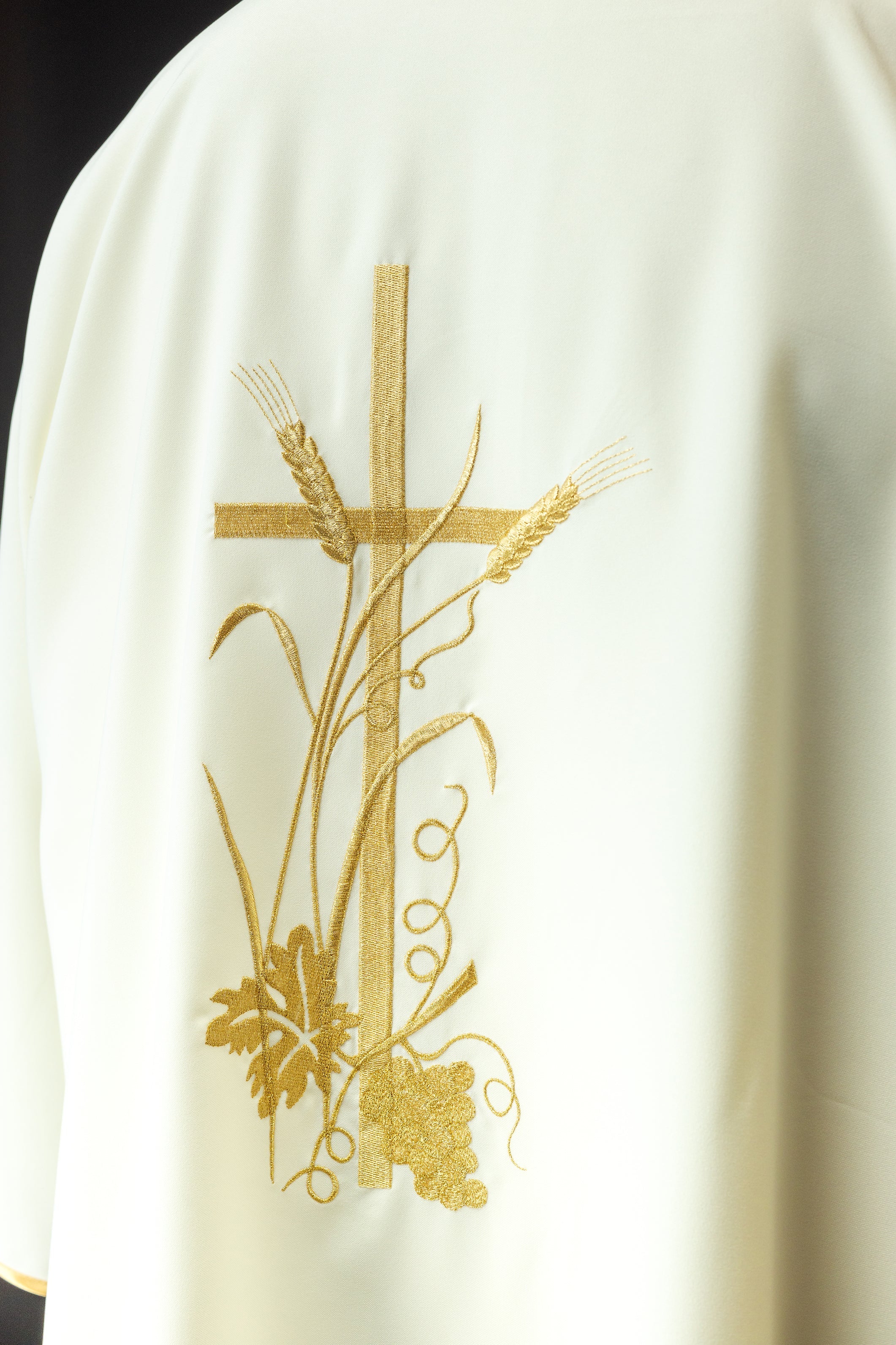 Ecru dalmatica with gold Pax cross embroidery