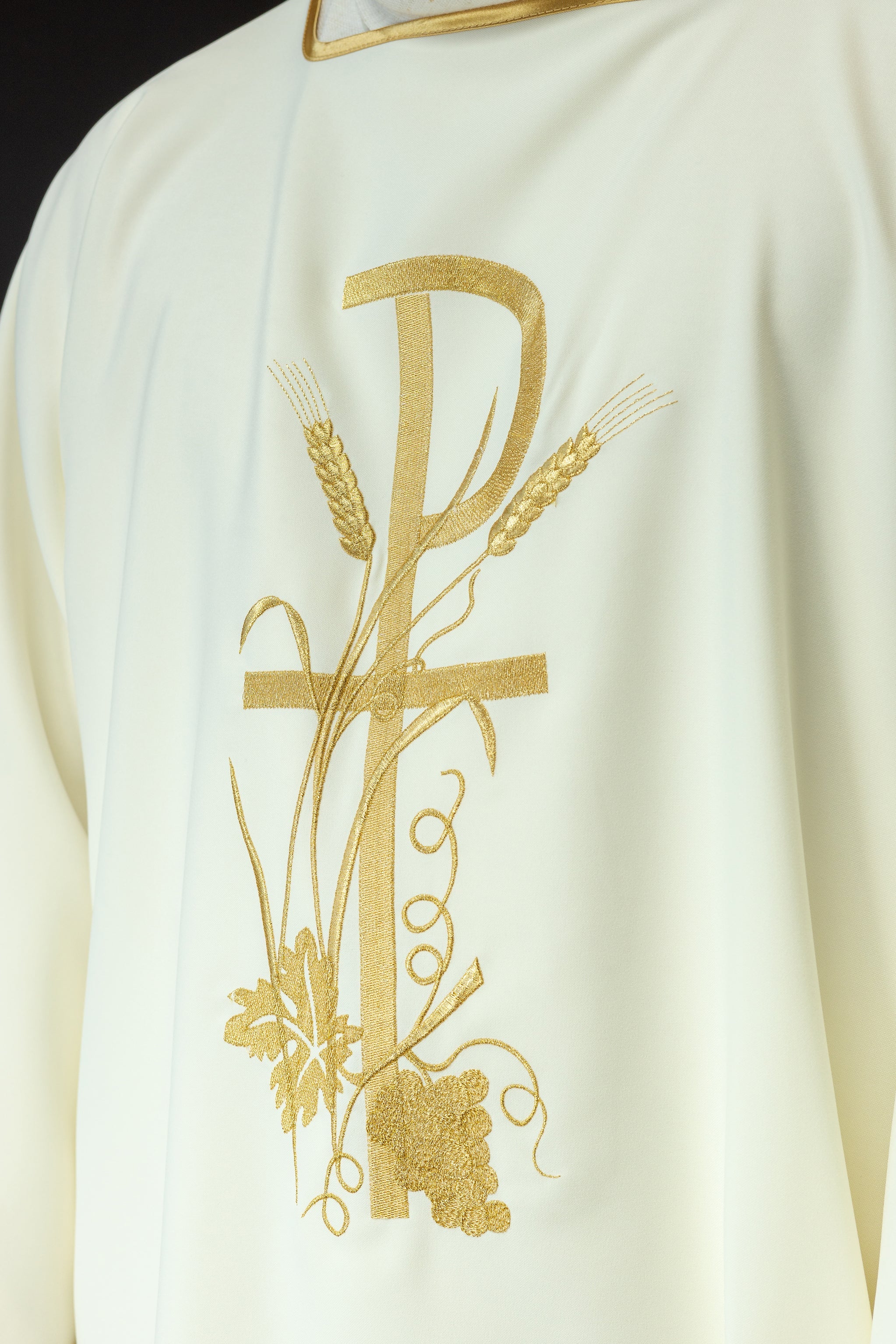 Ecru dalmatica with gold Pax cross embroidery