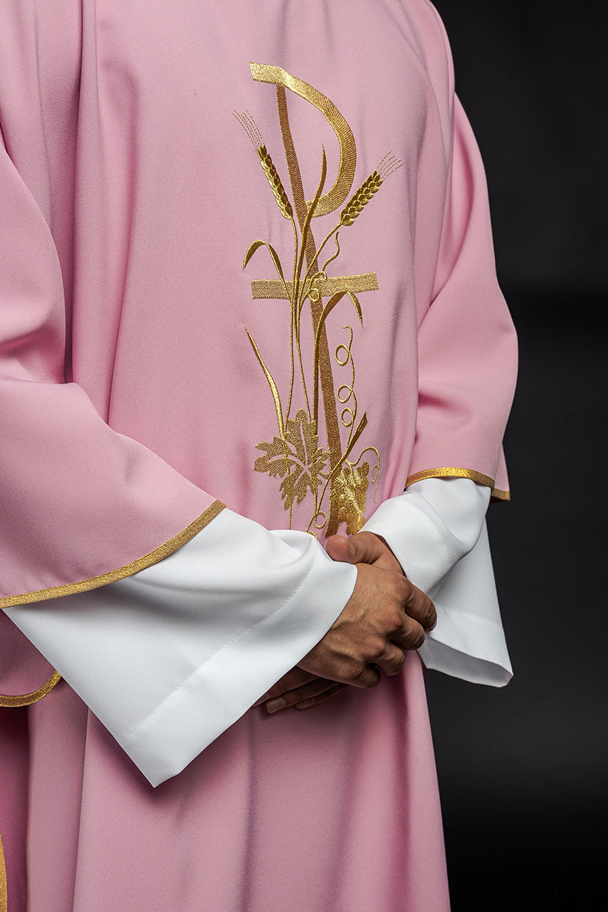 Pink dalmatic with gold Pax cross embroidery