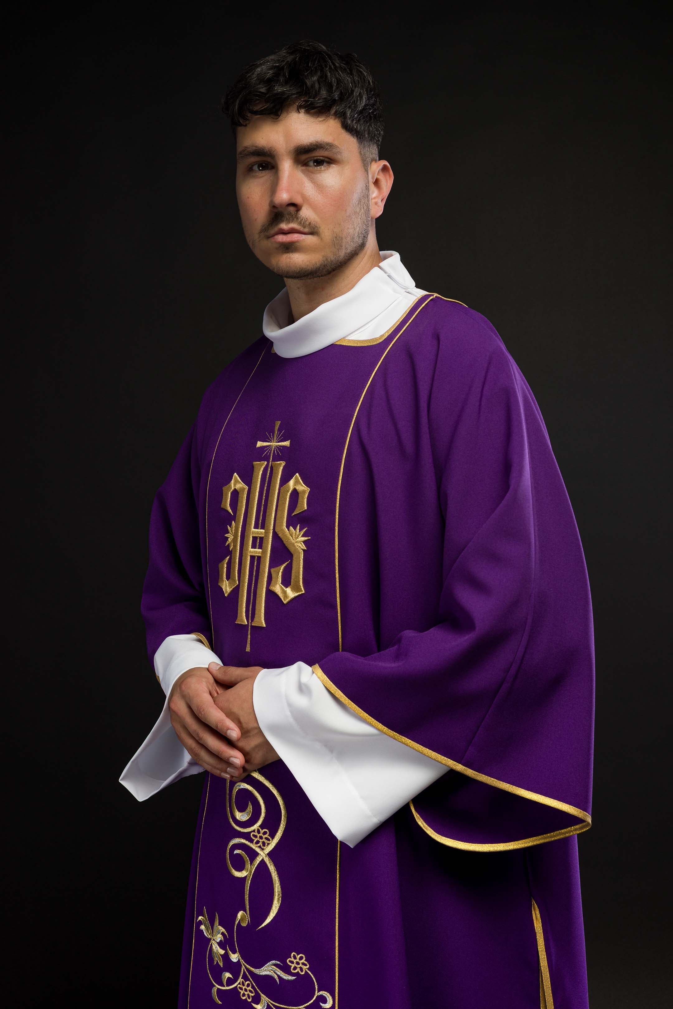 Purple dalmatic with embroidered IHS band
