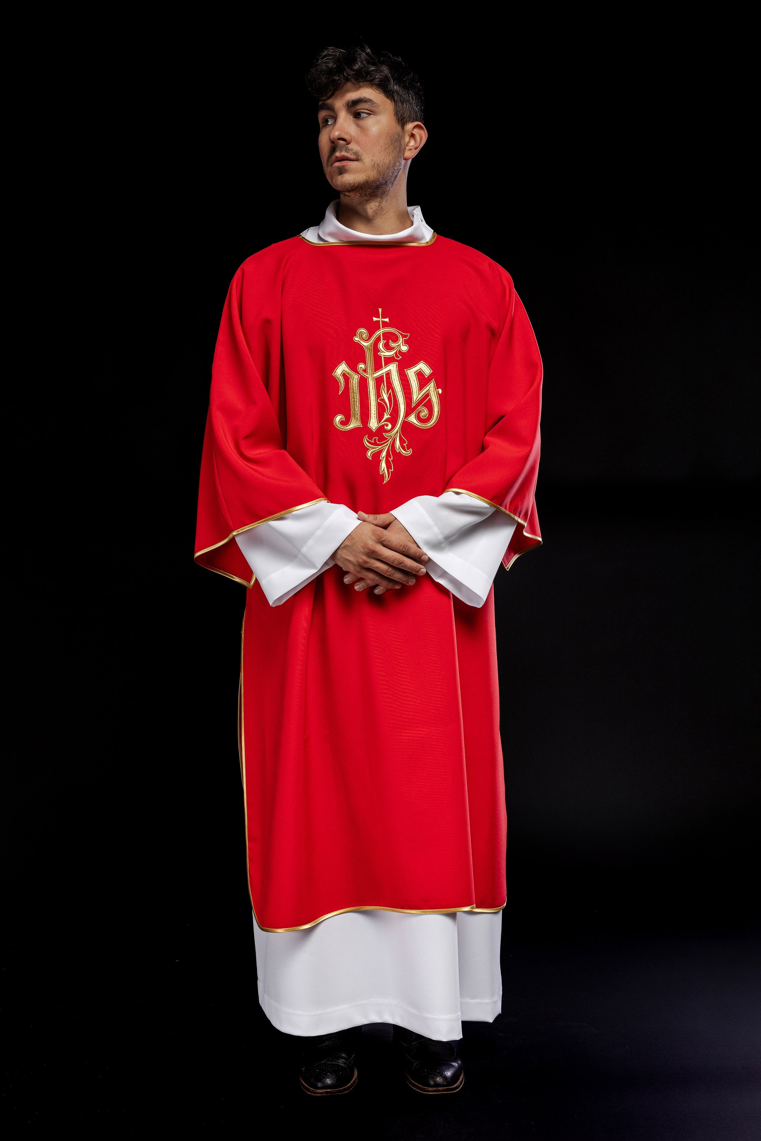 Red dalmatic chasuble with gold IHS