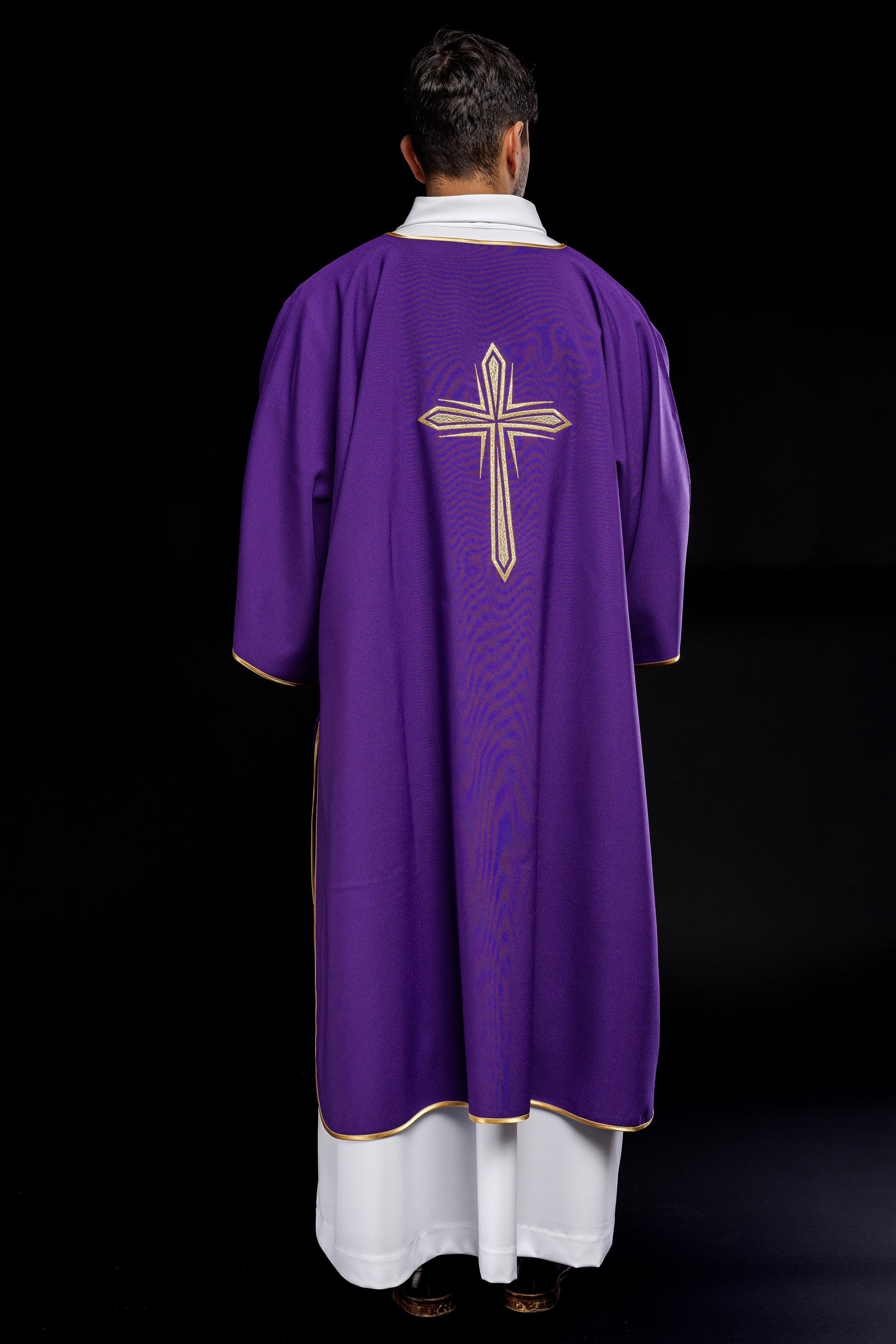 Purple dalmatic with embroidered gold cross