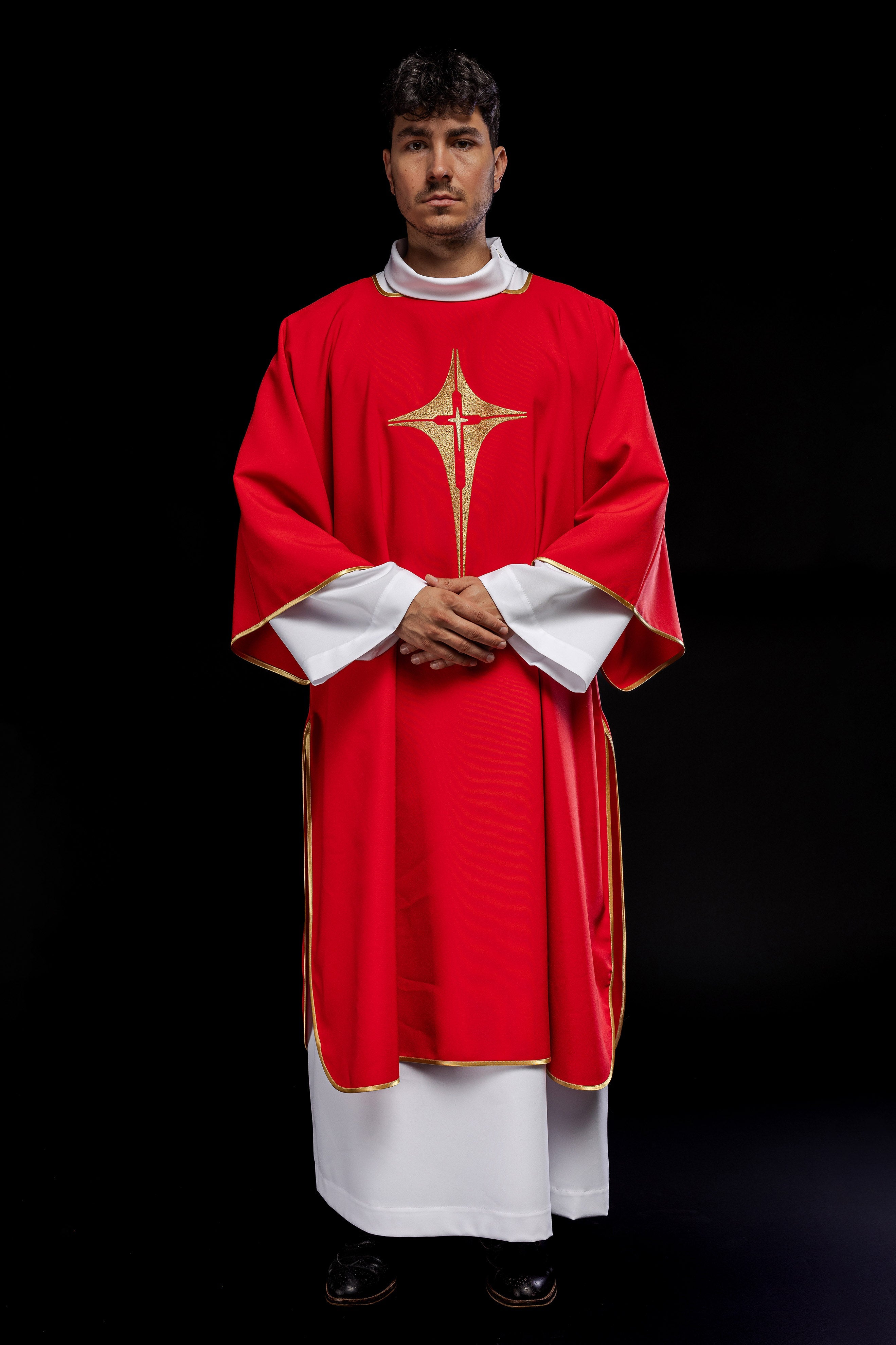 Red liturgical dalmatic with gold cross