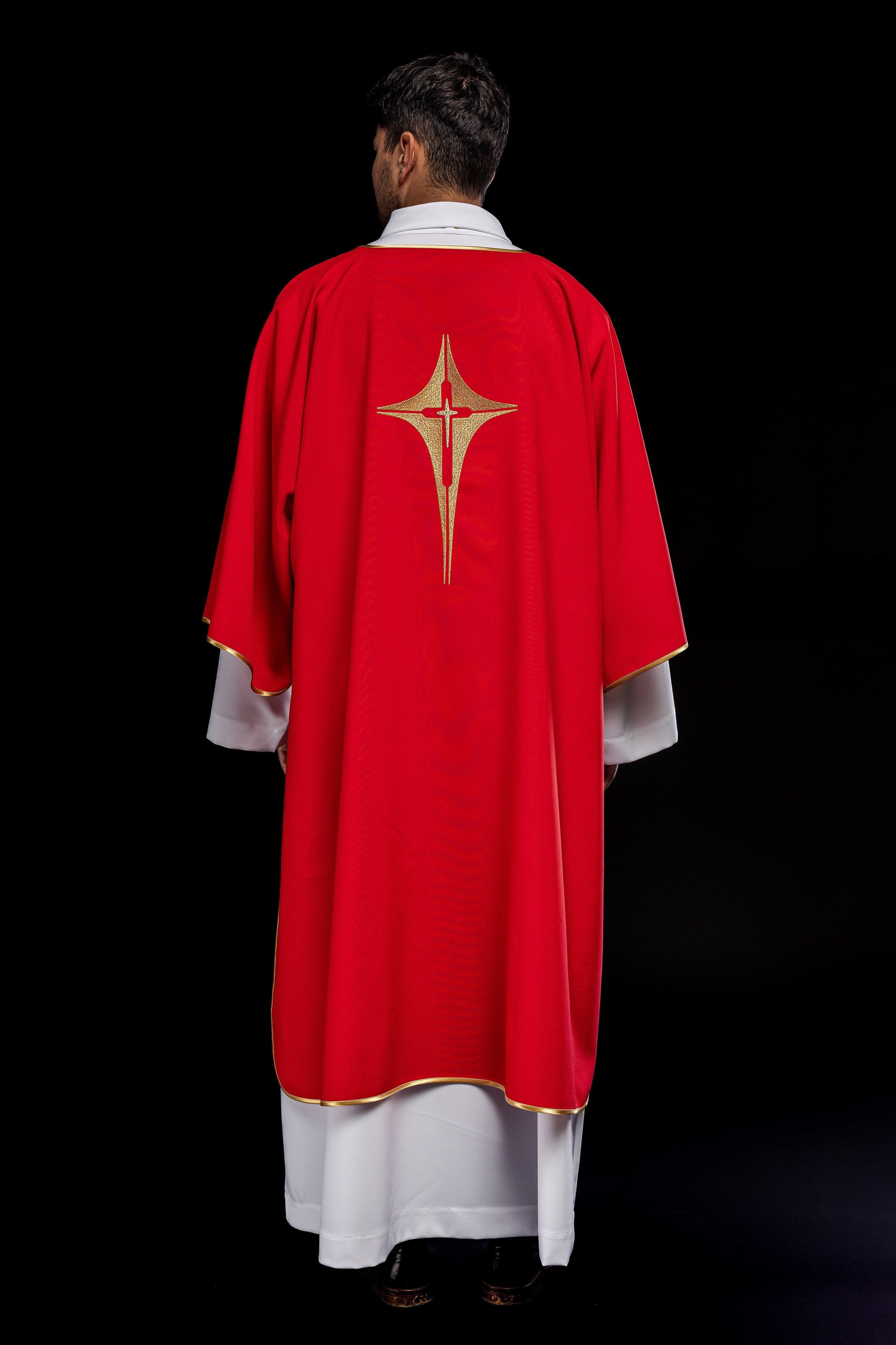 Red liturgical dalmatic with gold cross