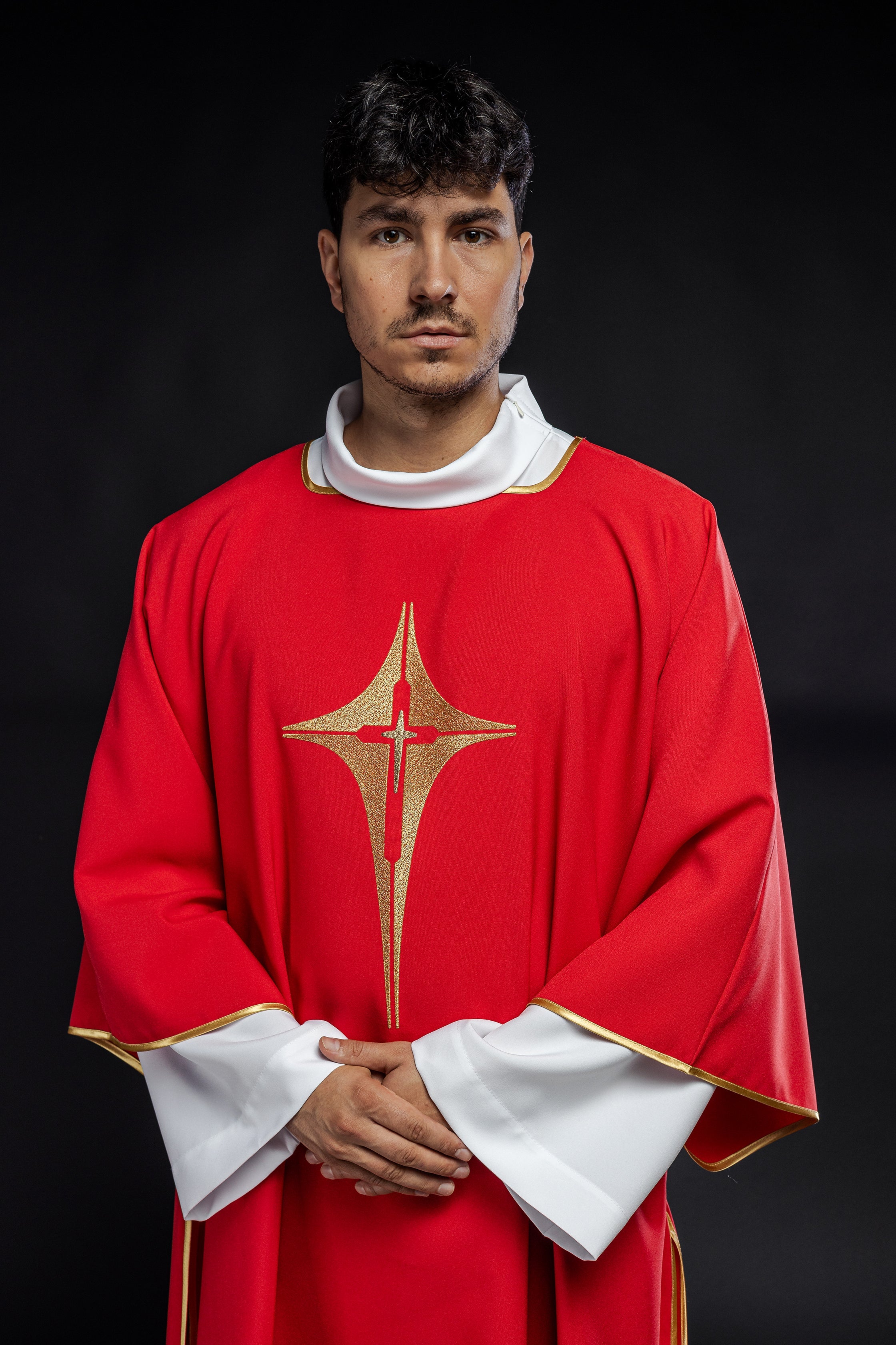 Red liturgical dalmatic with gold cross