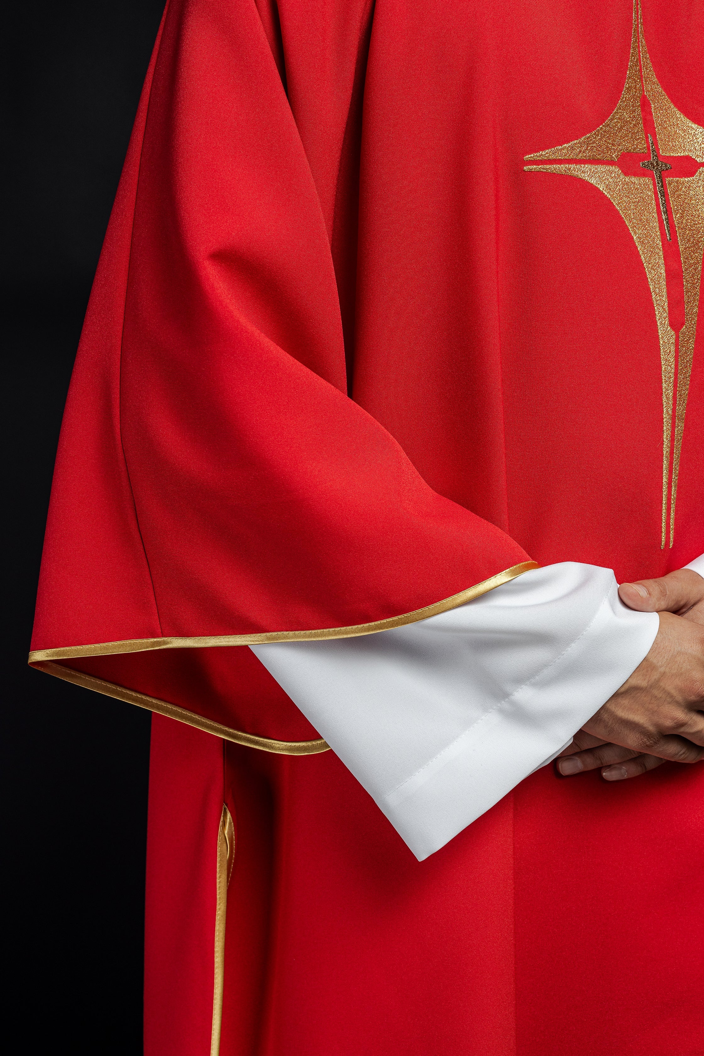 Red liturgical dalmatic with gold cross