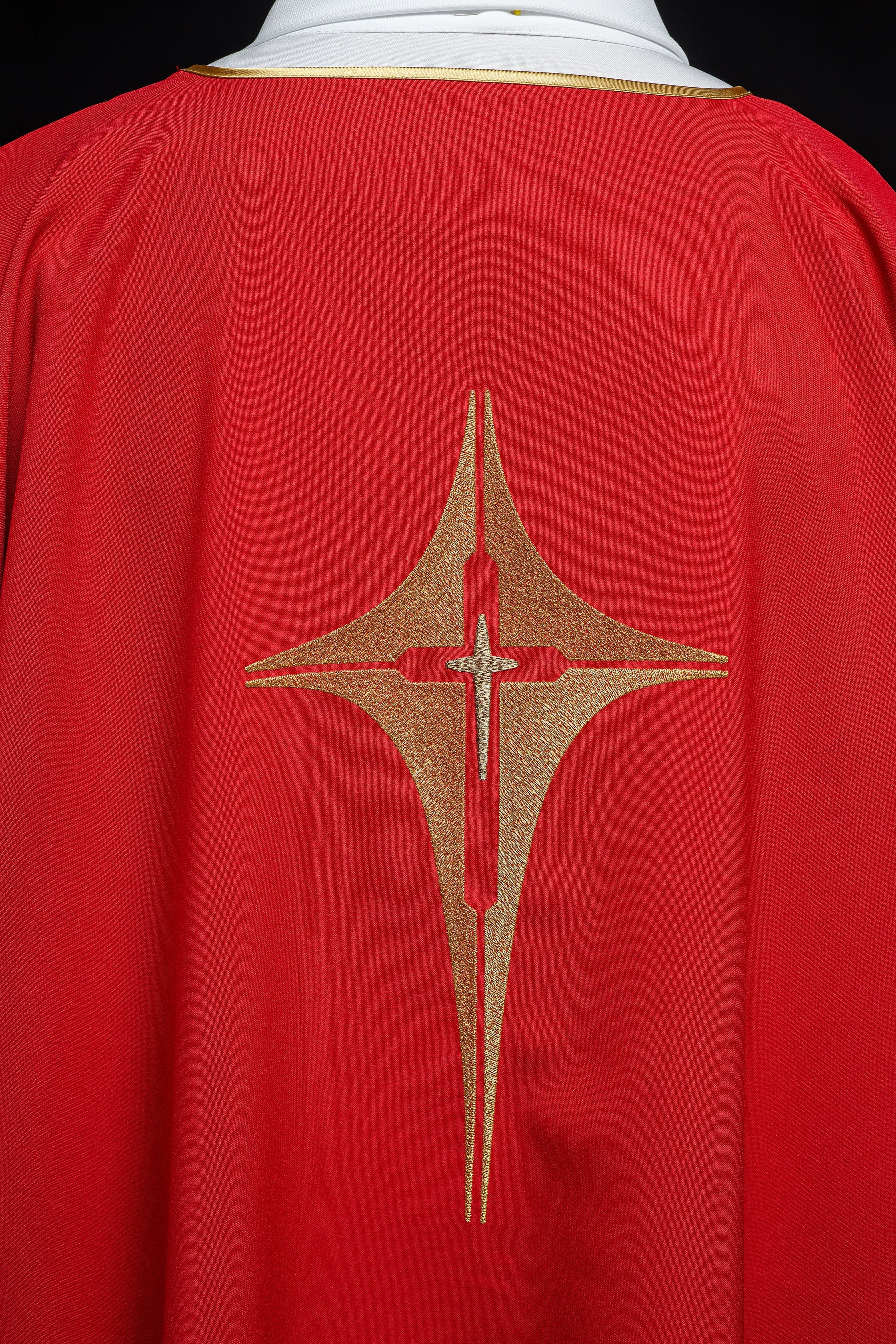 Red liturgical dalmatic with gold cross