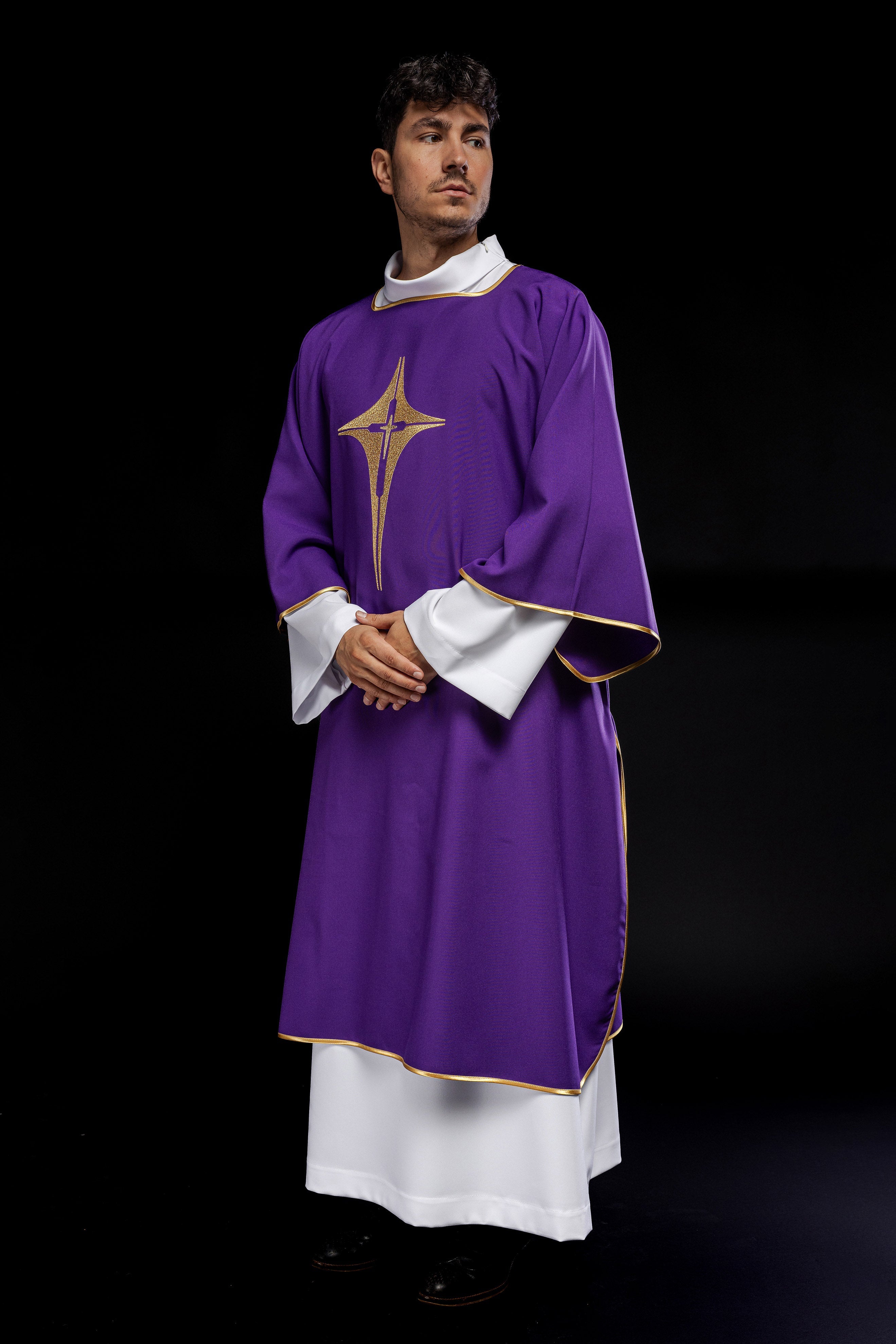 Purple liturgical dalmatic with embroidered gold cross