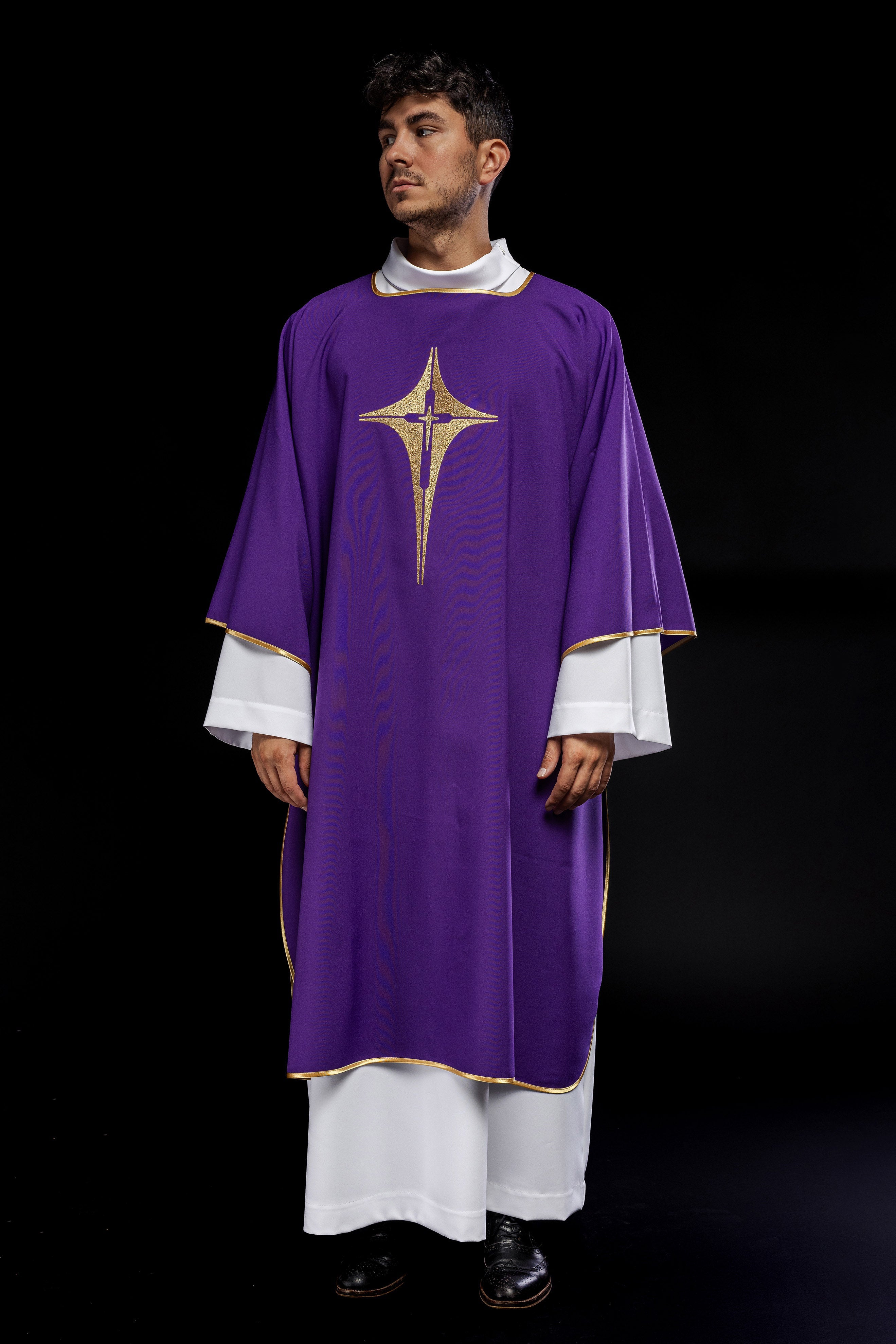 Purple liturgical dalmatic with embroidered gold cross