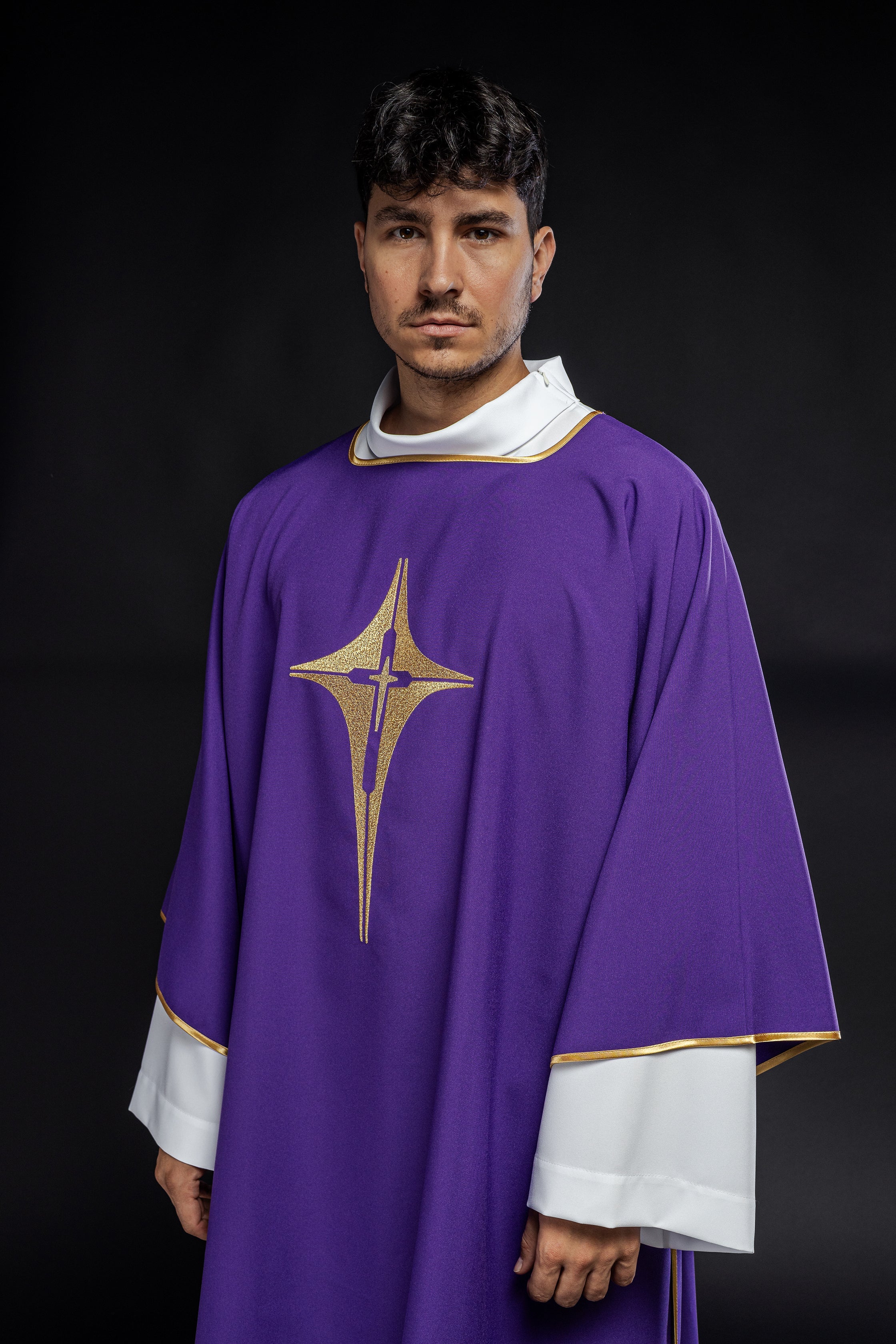 Purple liturgical dalmatic with embroidered gold cross