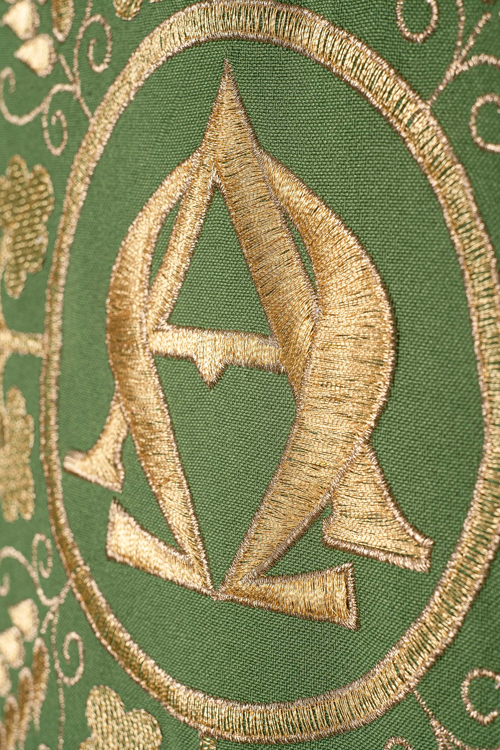 Embroidered green chasuble with Alpha and Omega symbols and wheat motifs