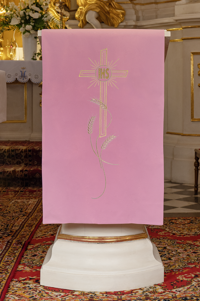 Lectern cover embroidered with a pink Cross and IHS motif