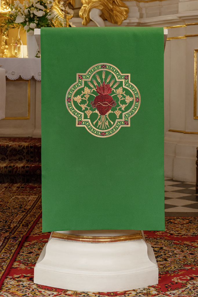 Lectern cover embroidered with a green Sacred Heart motif