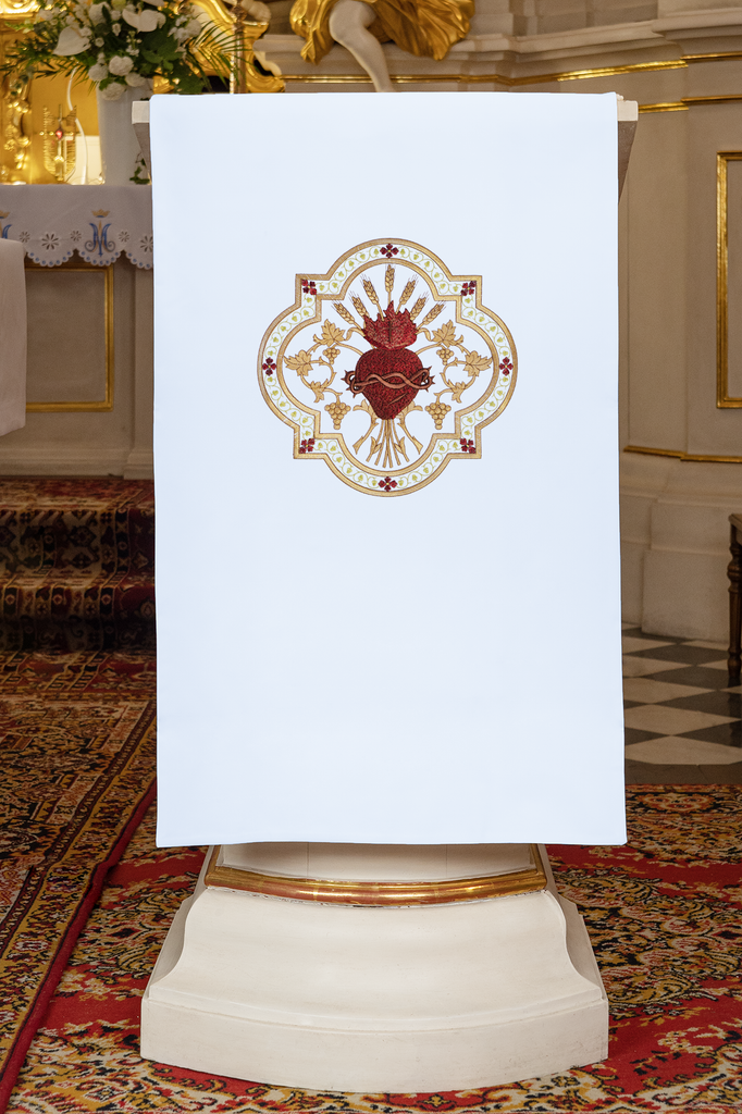 Lectern cover embroidered with a white Sacred Heart motif