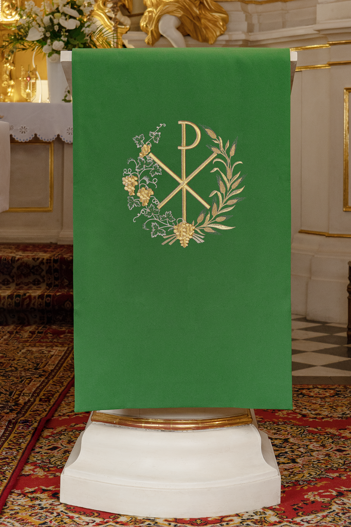 Lectern cover embroidered with a PAX motif in green