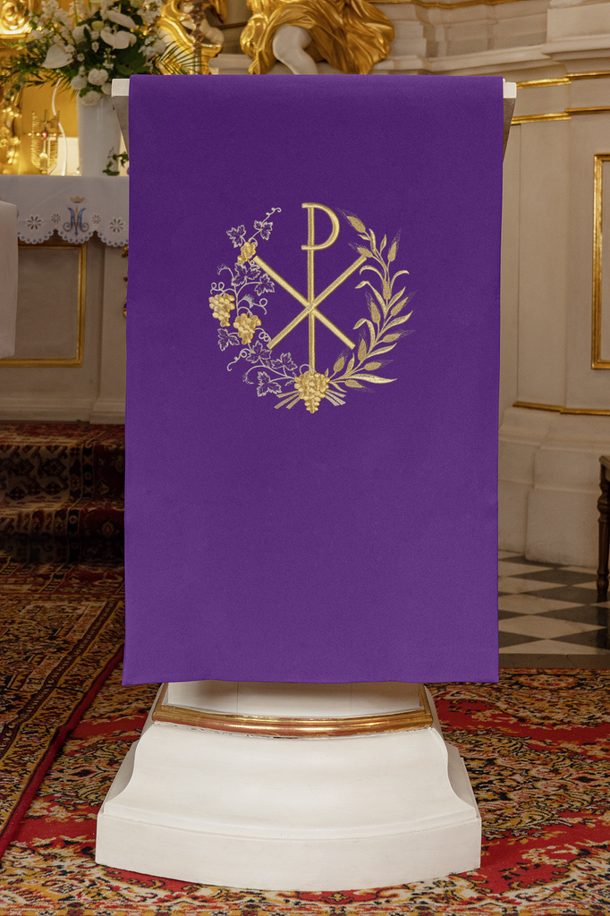 Lectern cover embroidered with a PAX motif in purple