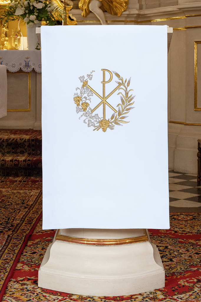 Lectern cover embroidered with a PAX motif in white