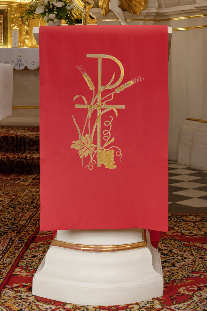 Lectern cover embroidered with a red Cross motif